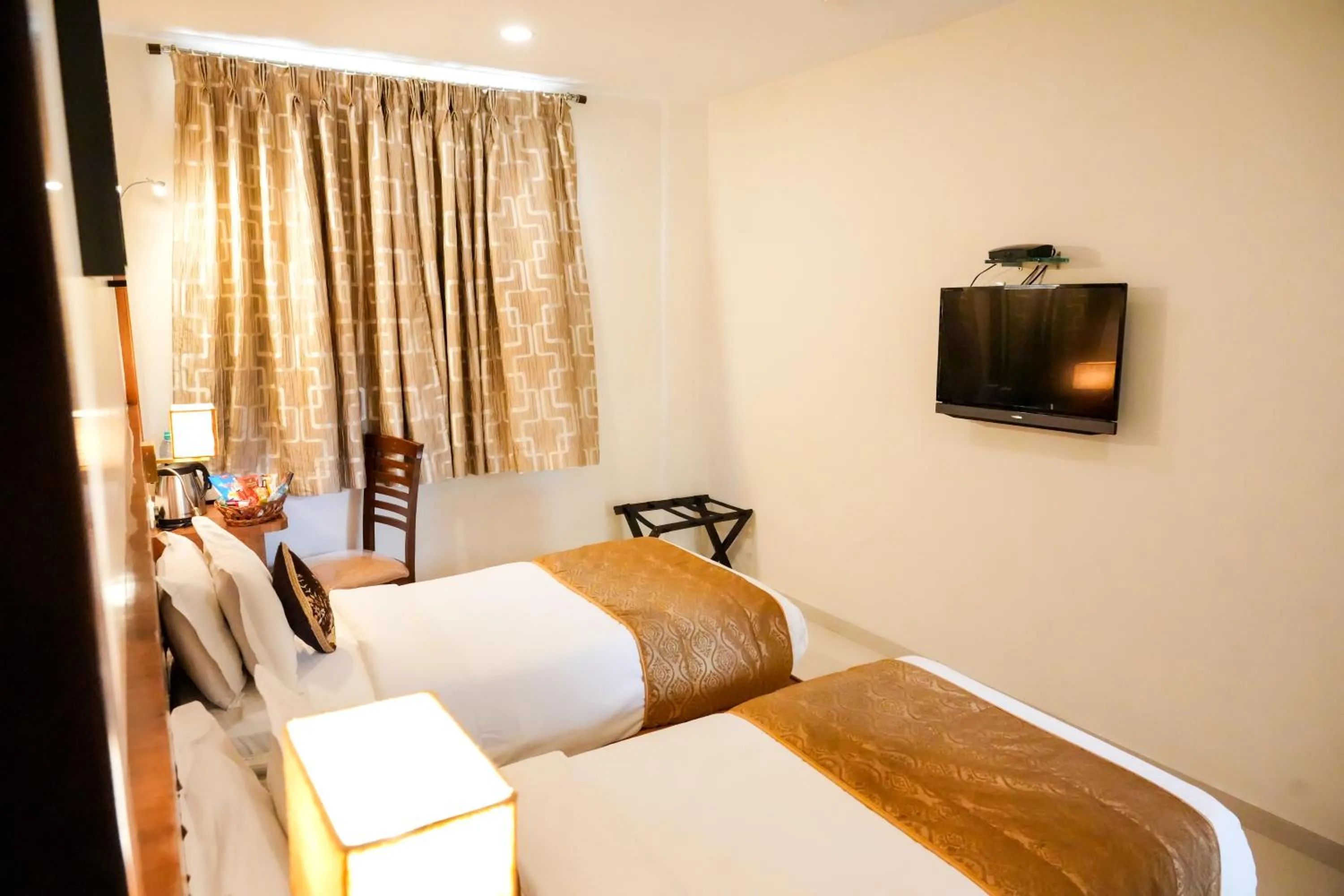 Bedroom, Bed in Hotel Sai Jashan Shirdi - Where blessings & comfort meet