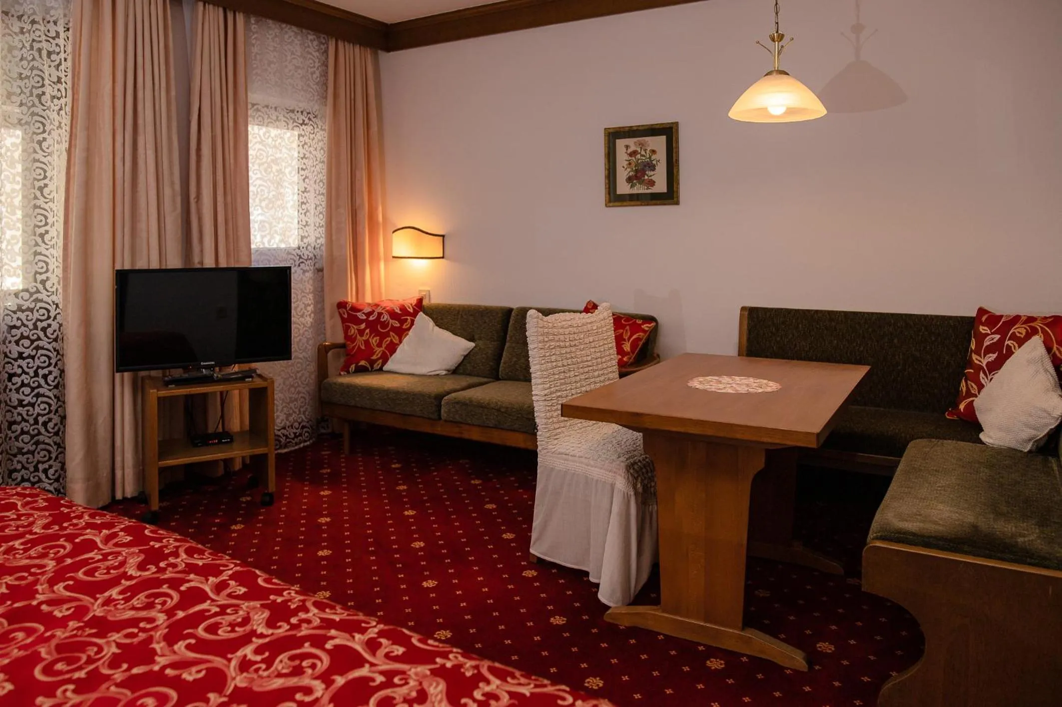 Living room, Bed in Hotel St. Georg