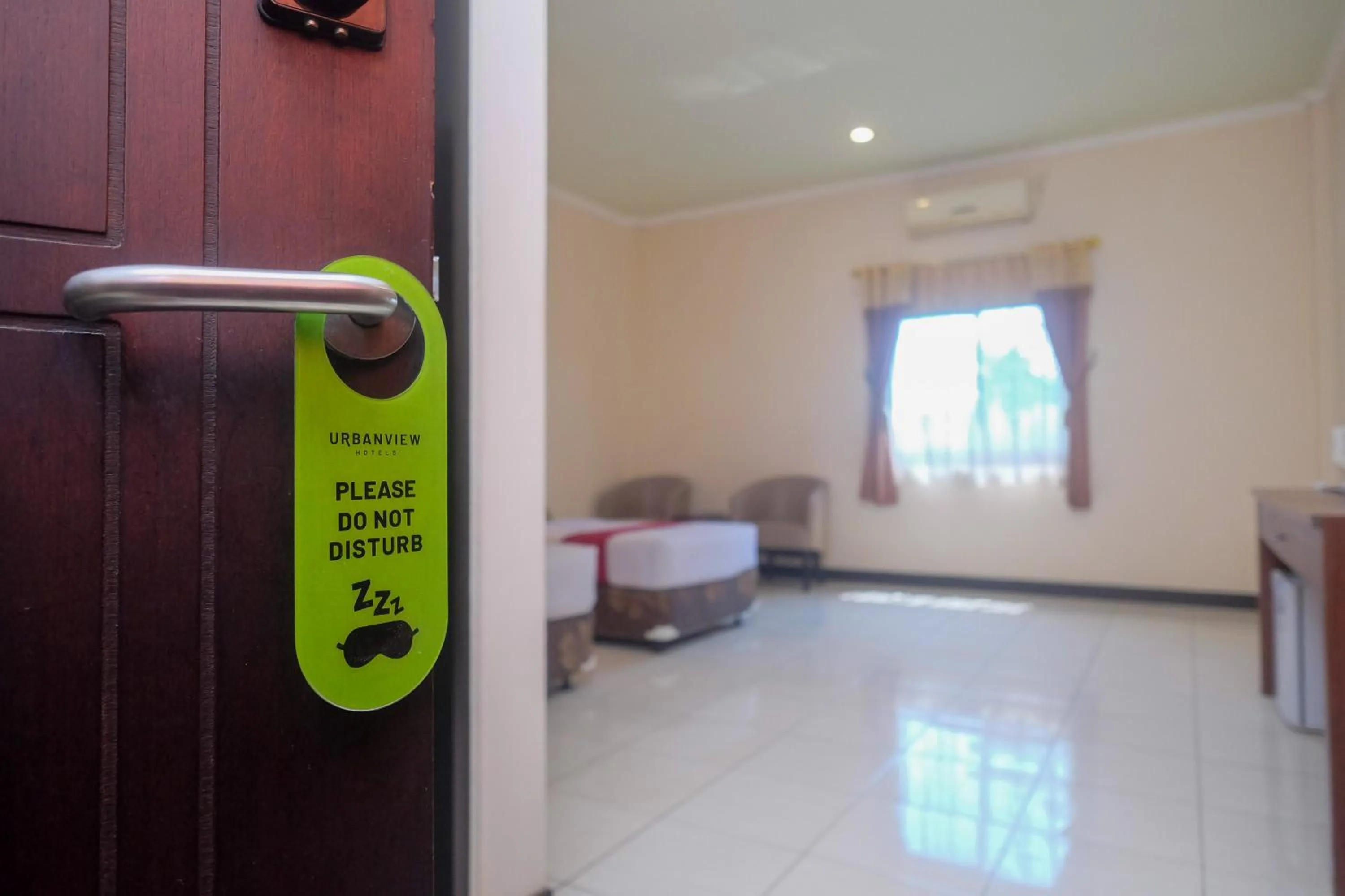 Bed in Urbanview Hotel Anggraeni Jatibarang