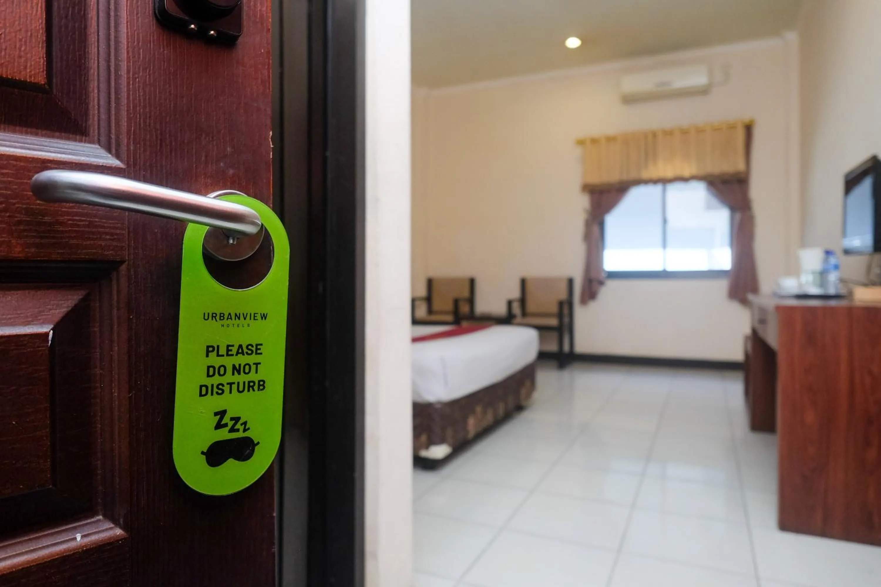 Bedroom, Bed in Urbanview Hotel Anggraeni Jatibarang