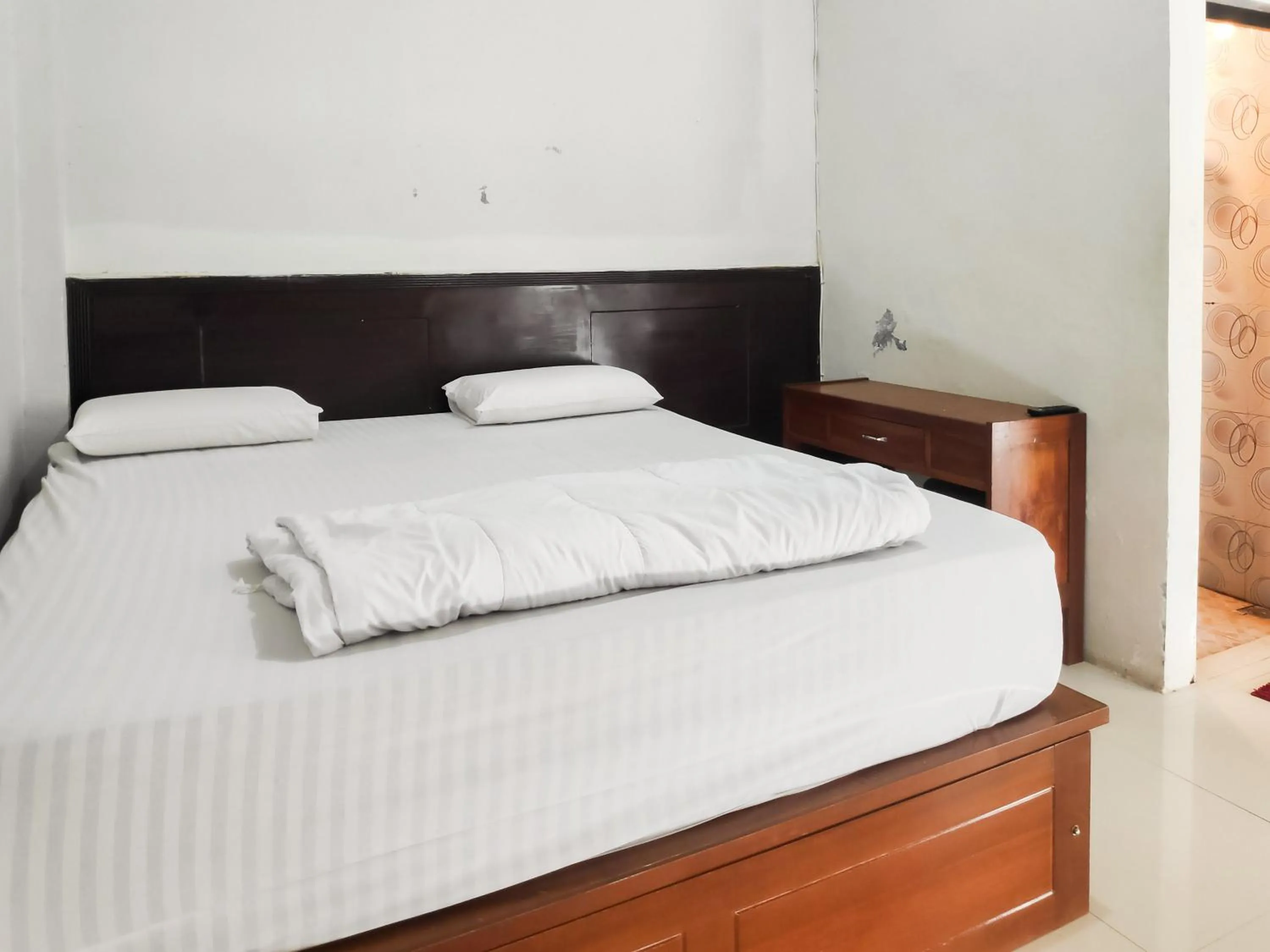 Bedroom, Bed in RedDoorz Syariah near Terminal Terpadu Langsa