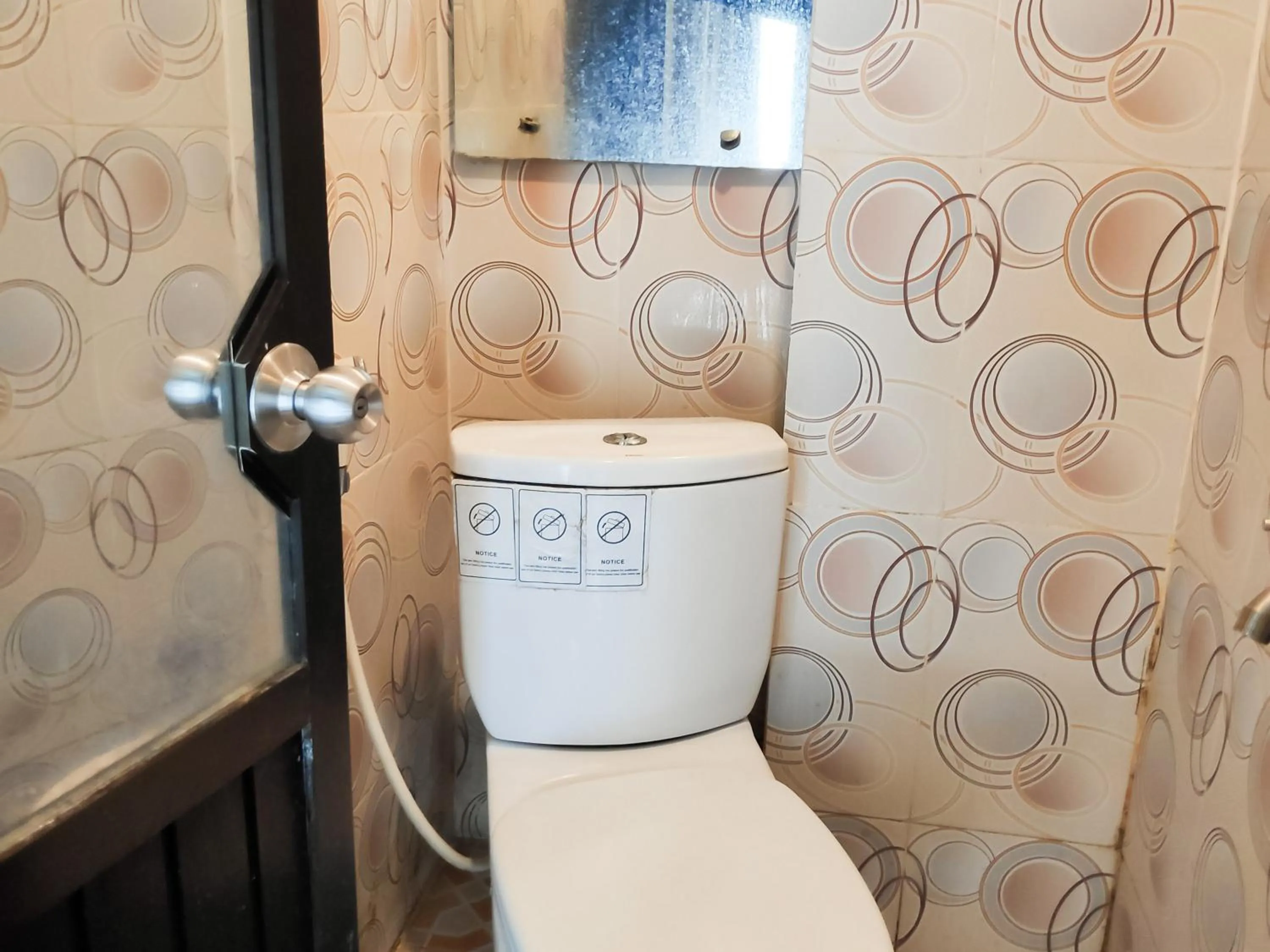 Bathroom in RedDoorz Syariah near Terminal Terpadu Langsa