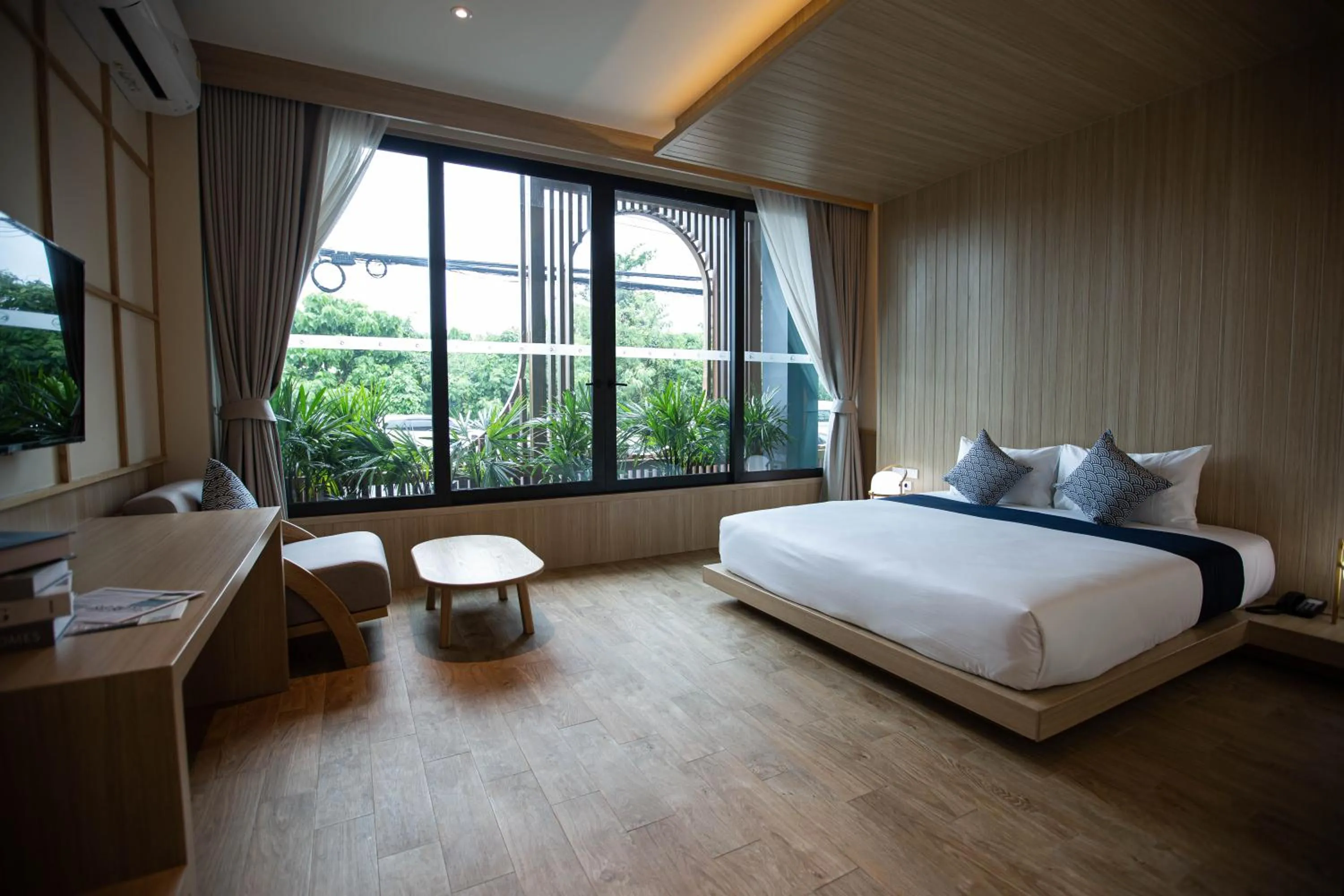 Photo of the whole room, Bed in The Arch Phuket Hotel