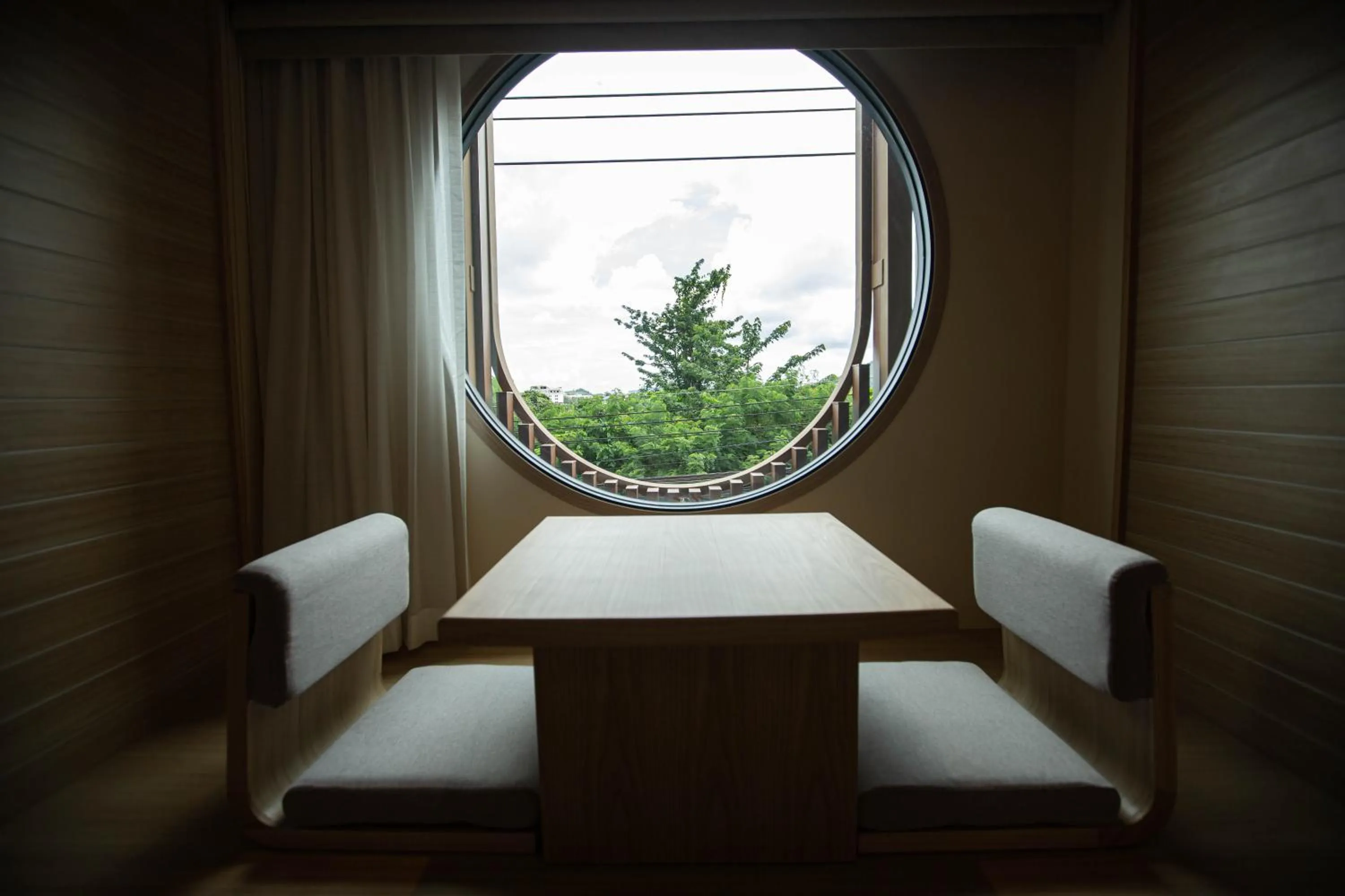 Seating area in The Arch Phuket Hotel