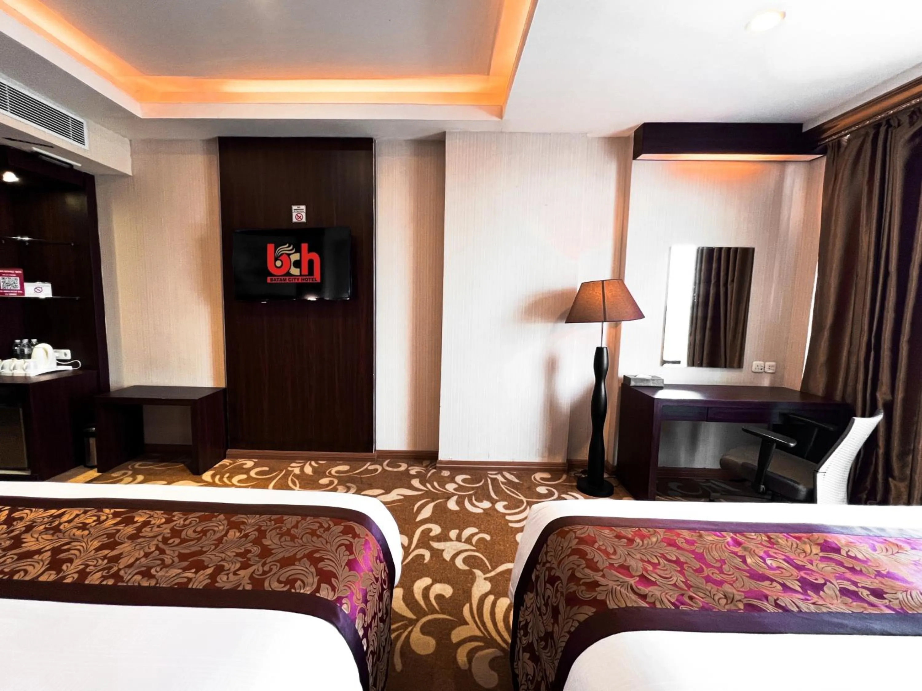 Bed in Batam City Hotel