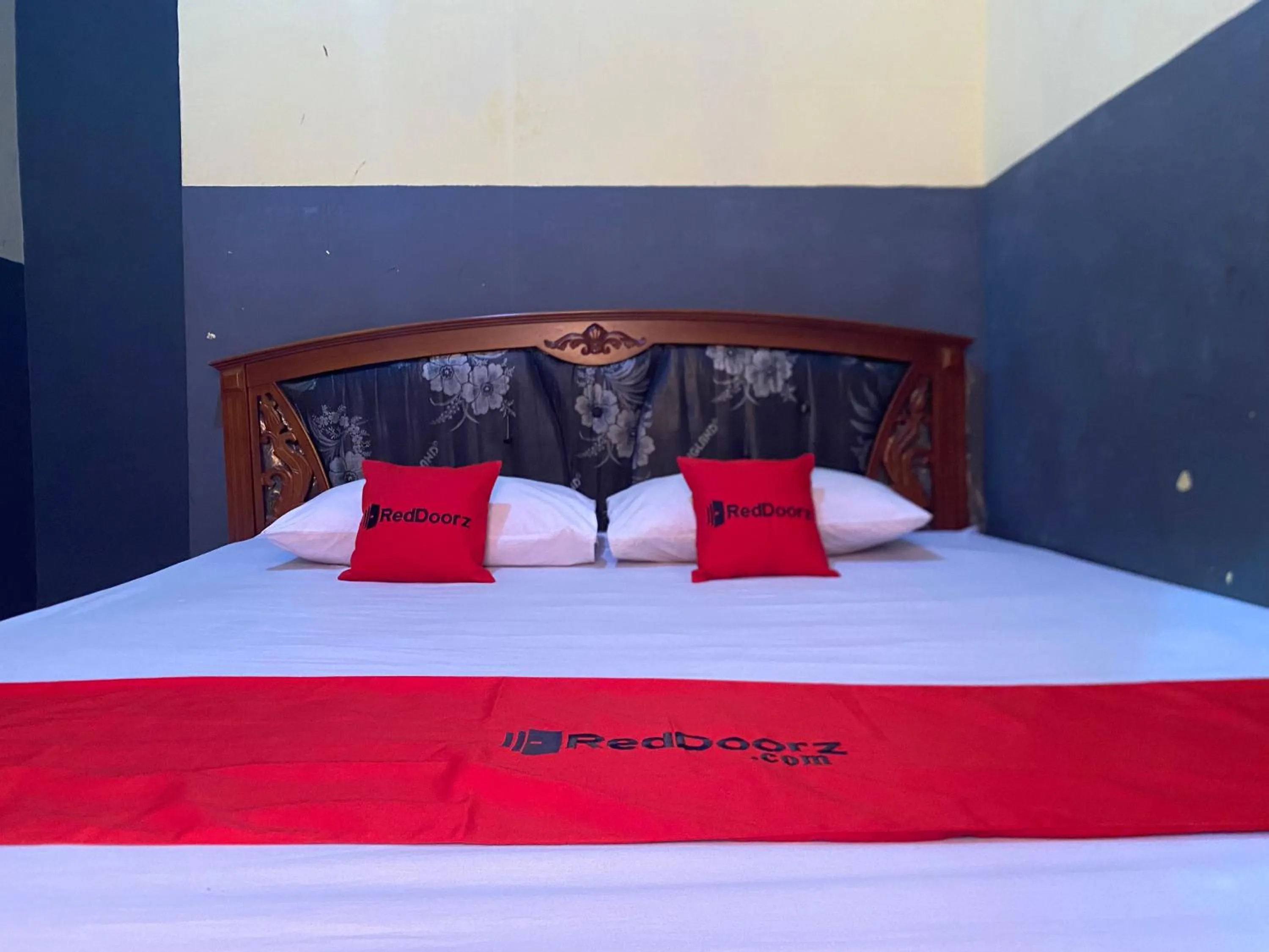 Bed in RedDoorz @ Wisma Sentosa Palopo