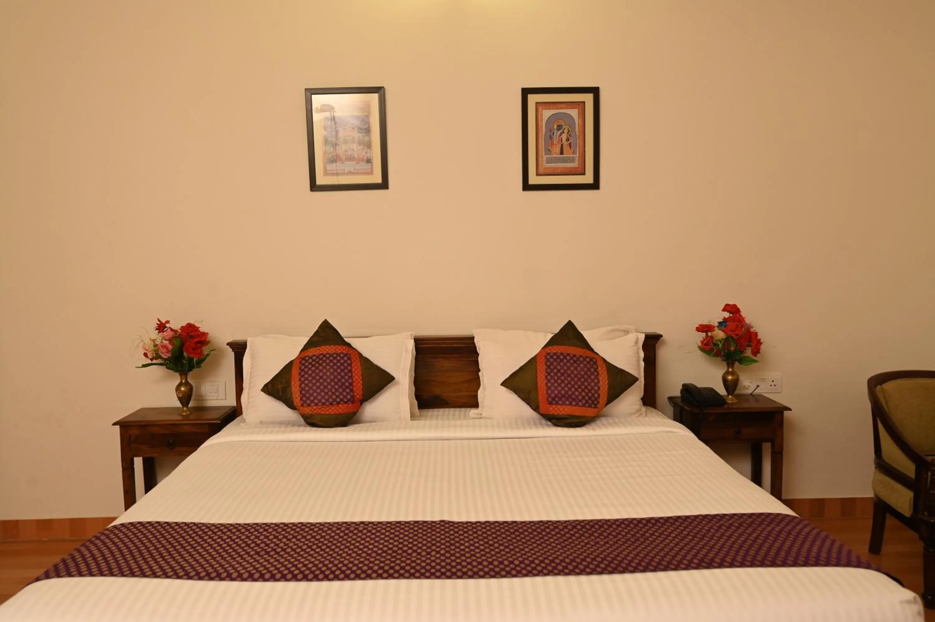 Bed in ClarksInn Suites Ranthambhore