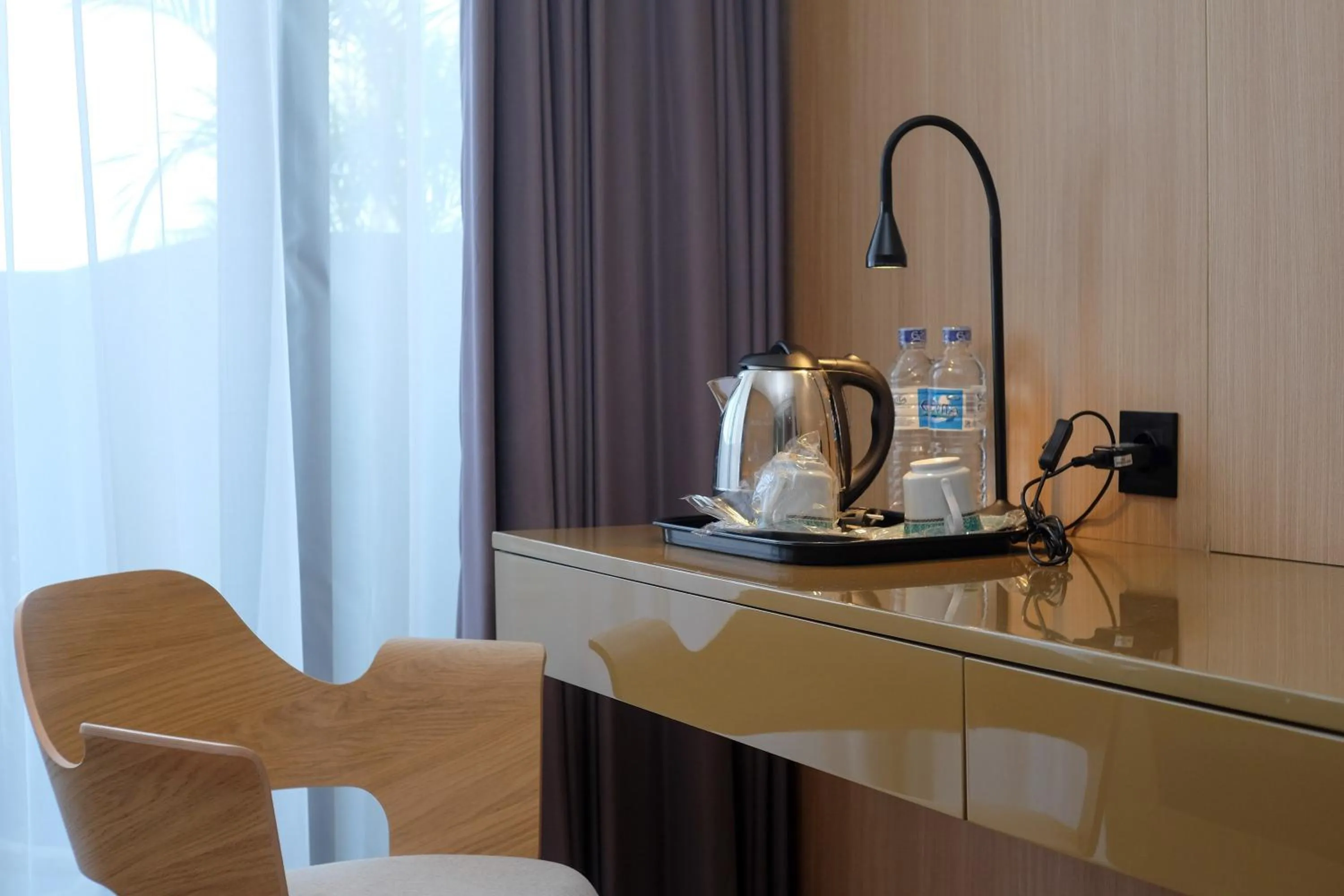 Coffee/tea facilities in Sans Hotel RG Living Jogja by RedDoorz