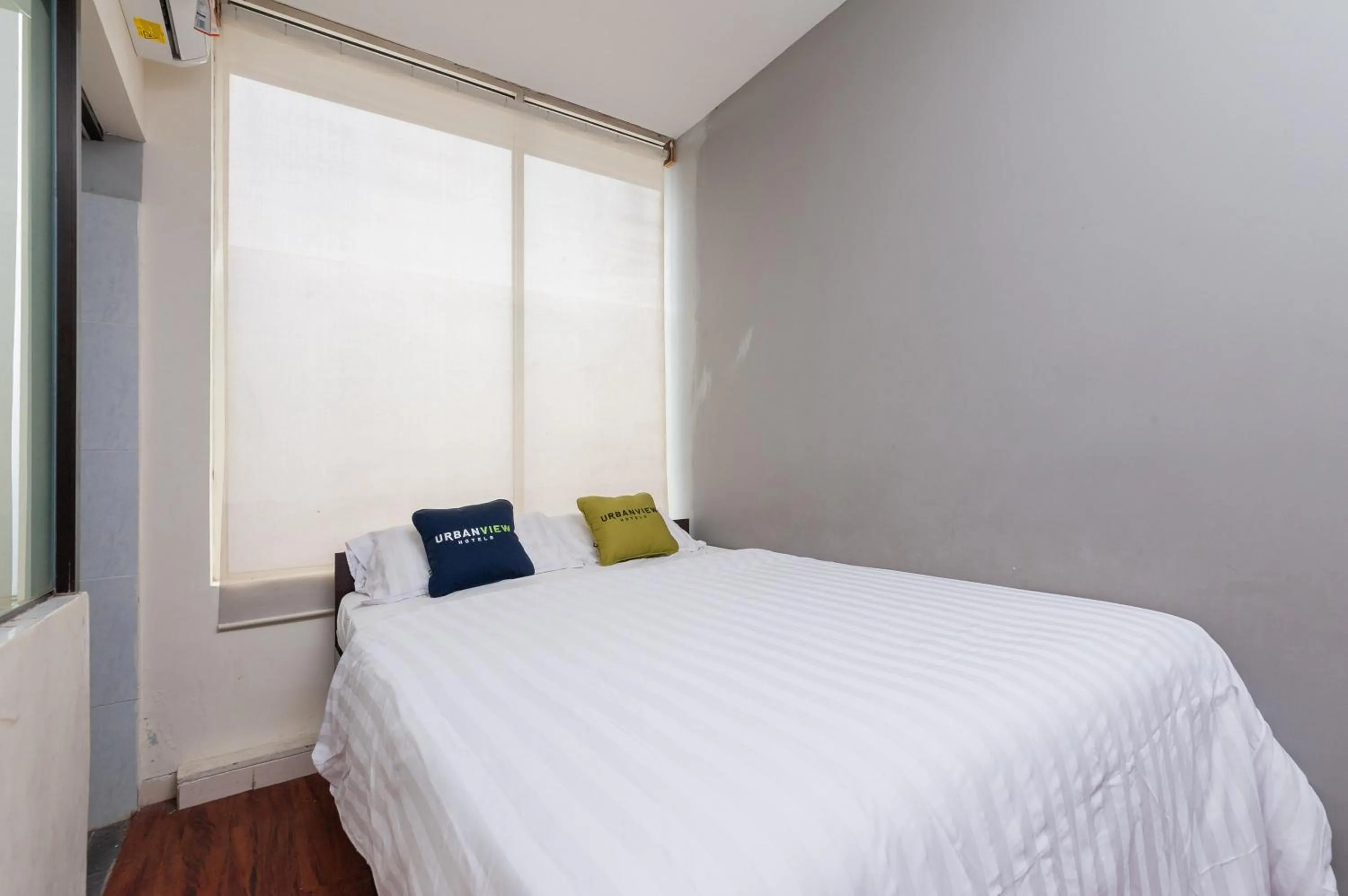 Bed in Urbanview Hotel Ellegan Residence Alam Sutera Serpong