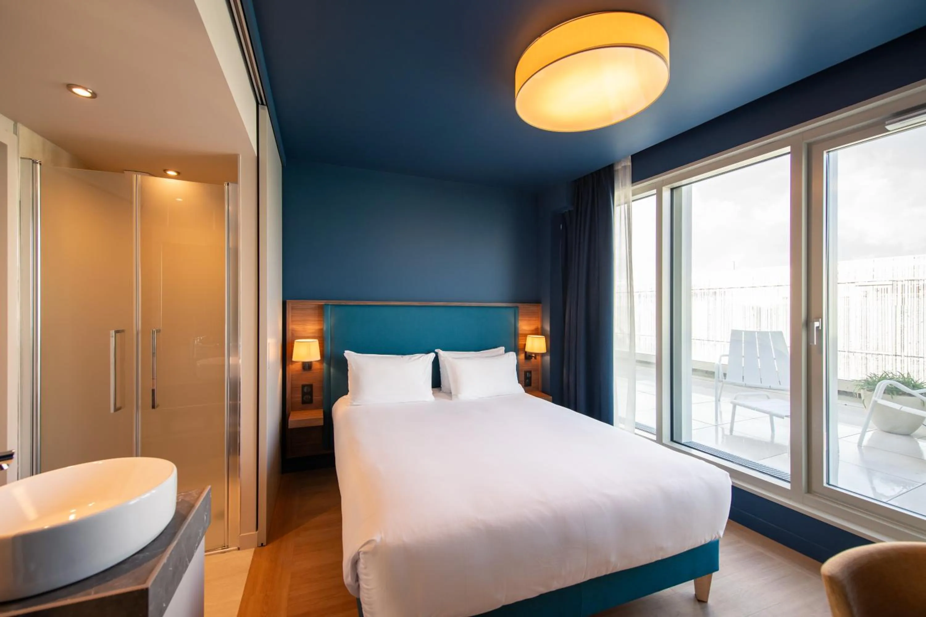 Bed in Hôtel de la Cité