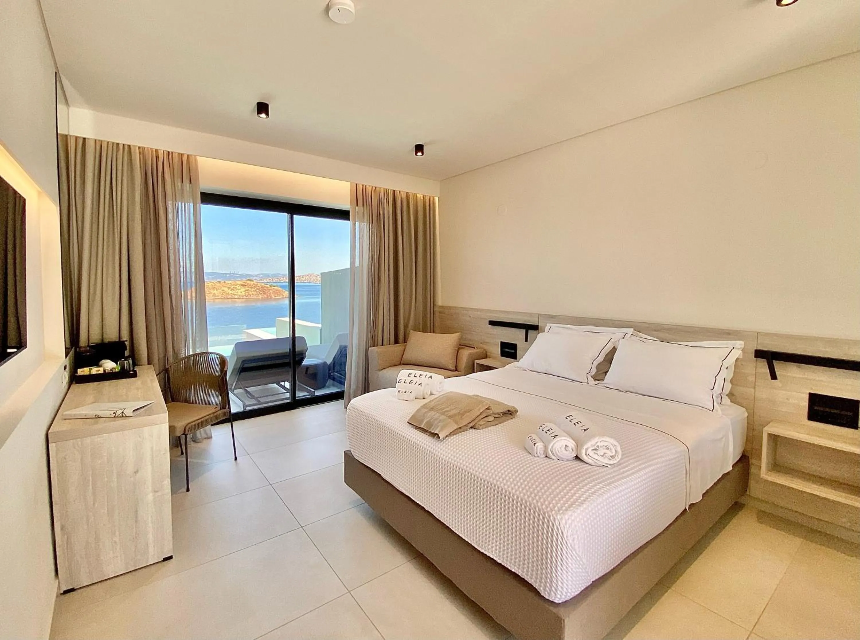 Bed in Eleia Seafront Rooms & Villas