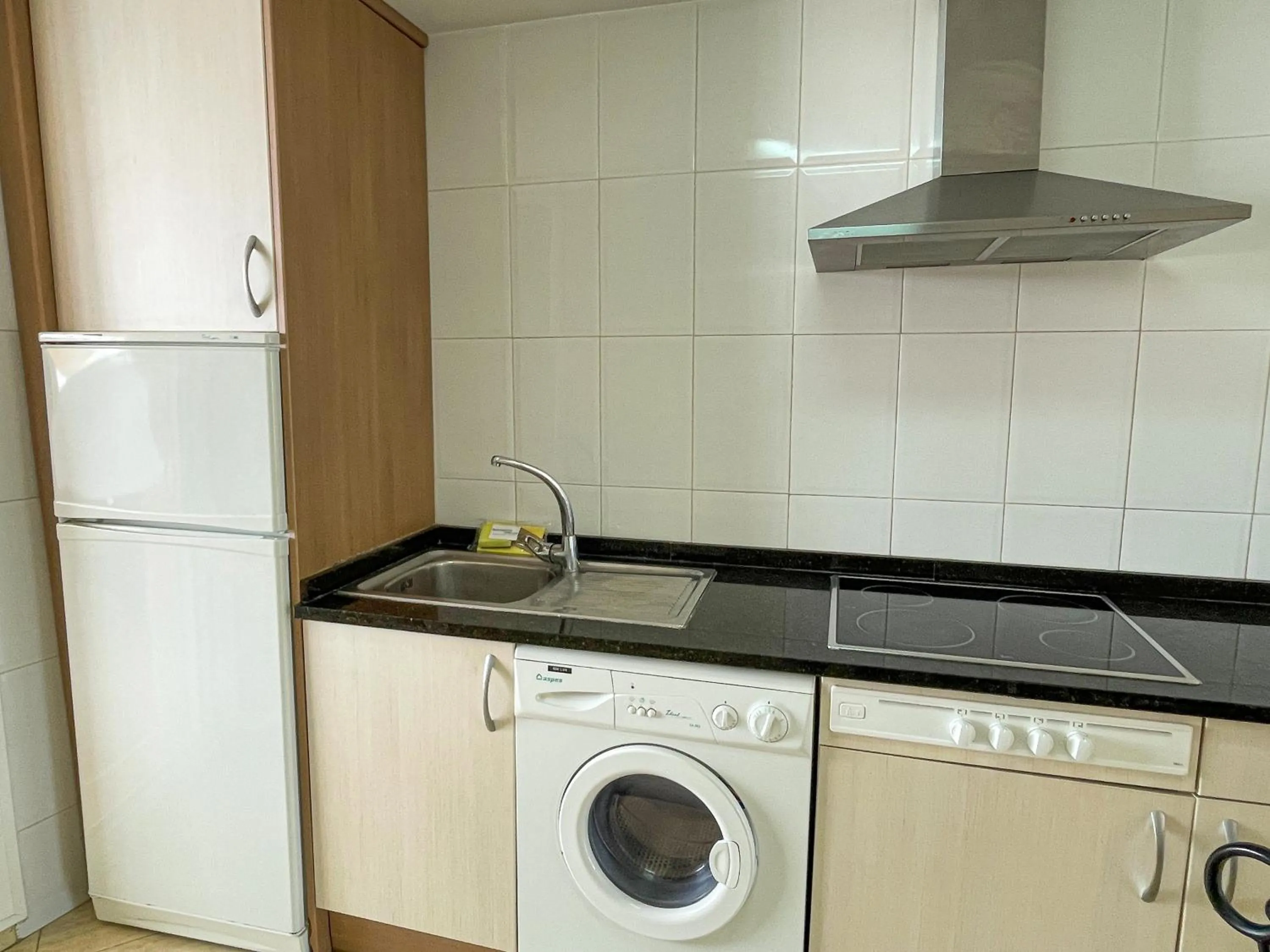 Kitchen or kitchenette in Apartamentos Marcomar 3000