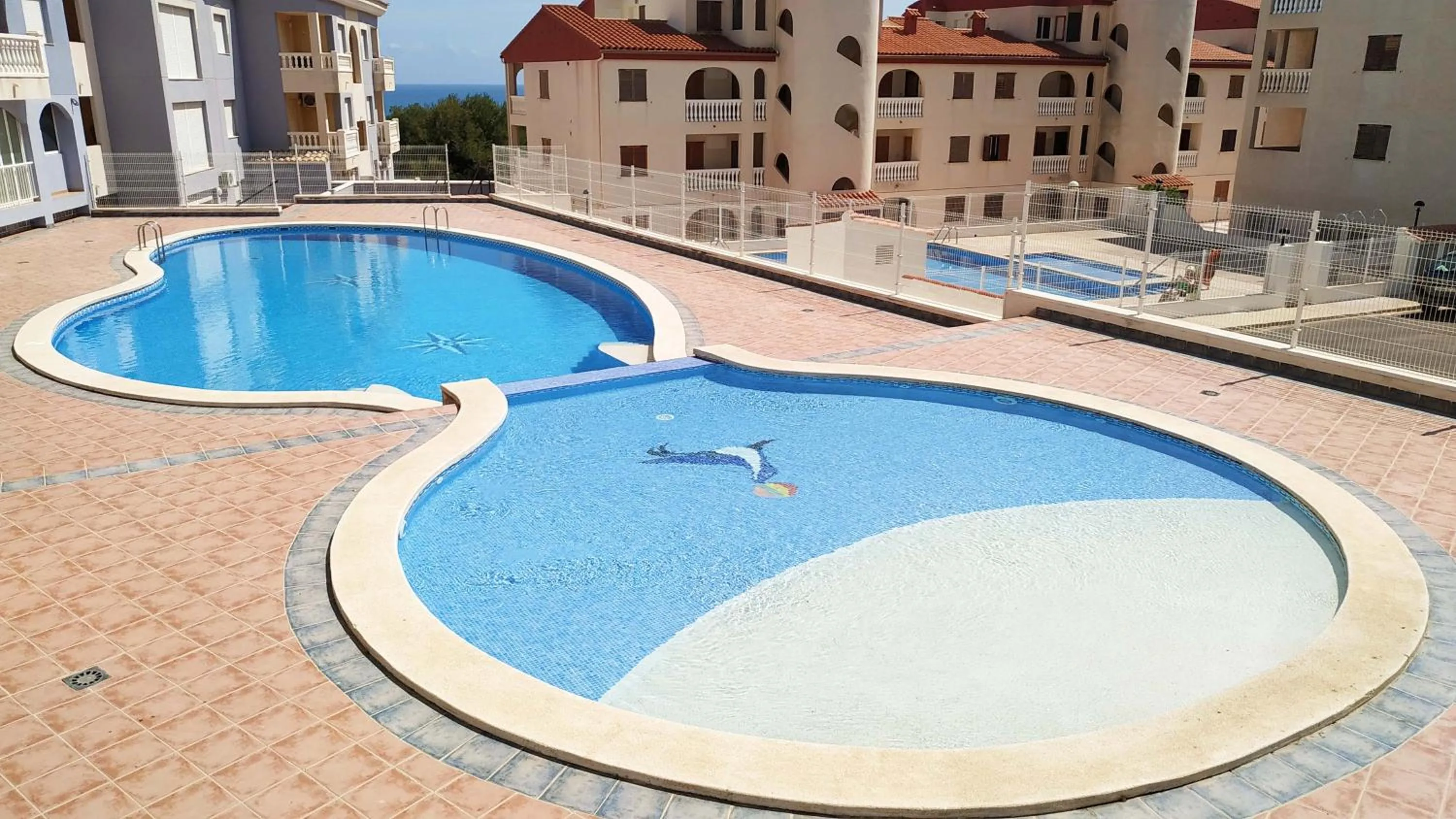 Swimming pool in Apartamentos Marcomar 3000