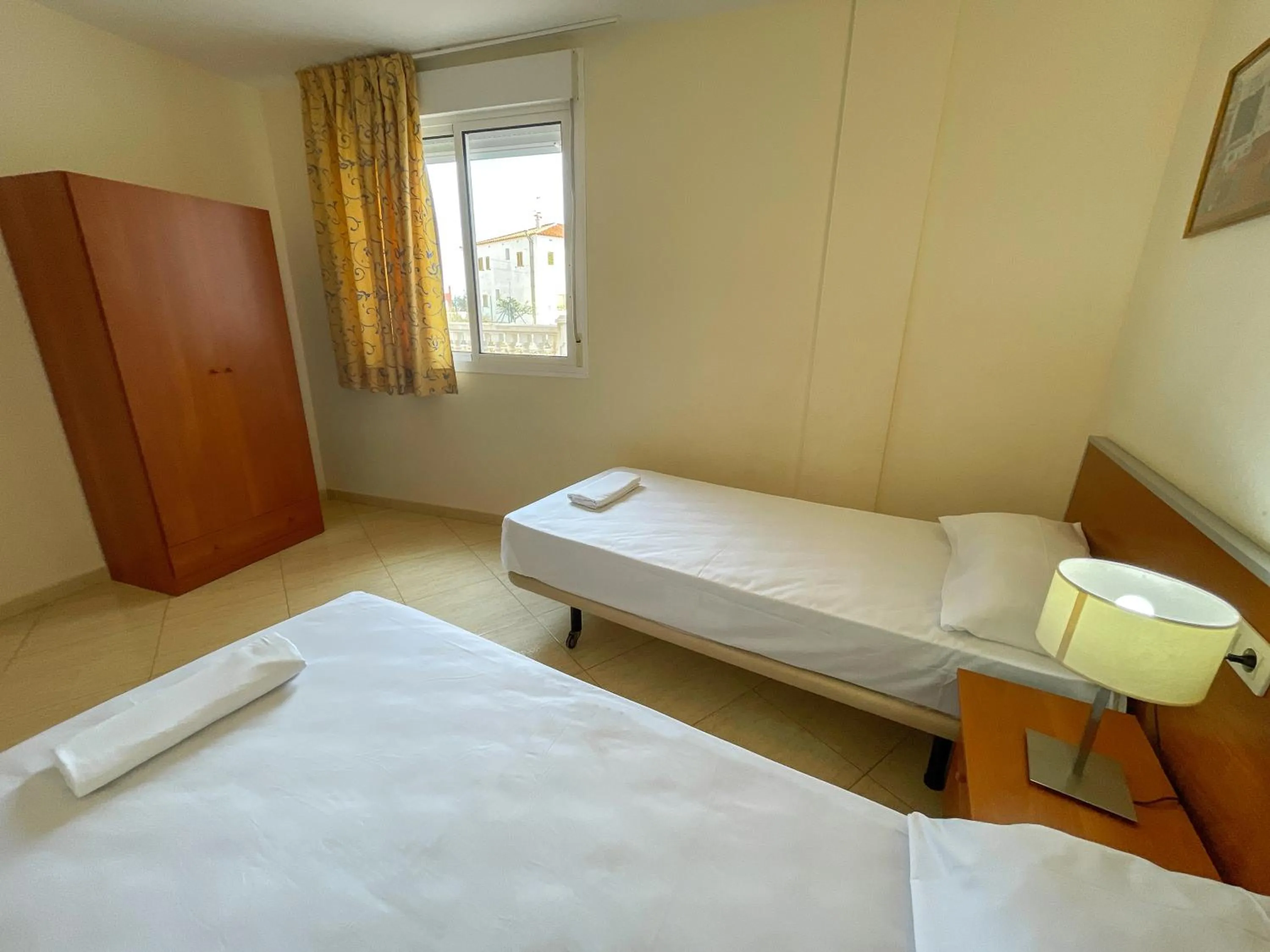 Bed in Apartamentos Marcomar 3000