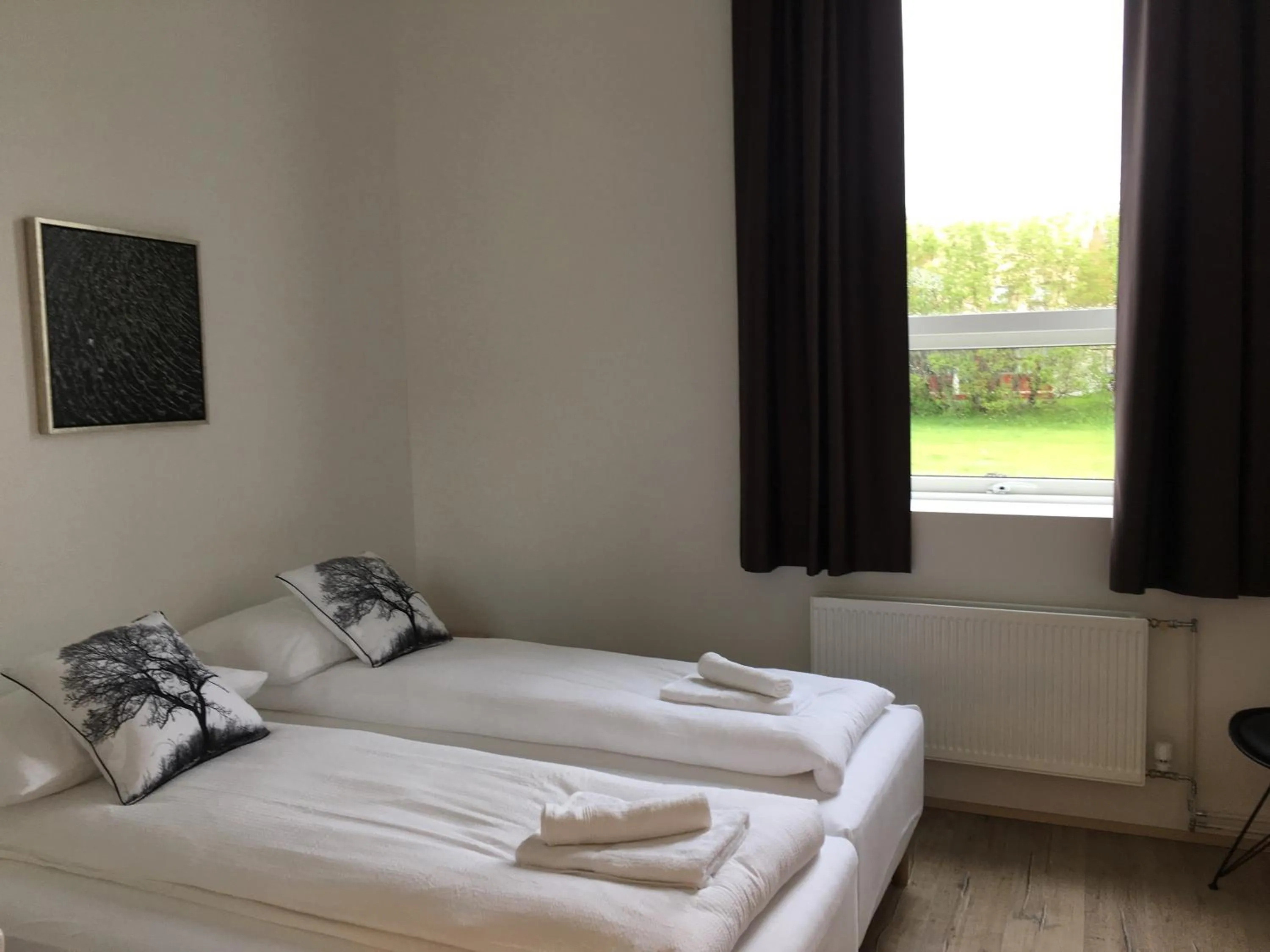 Bed in Welcome Riverside Guesthouse