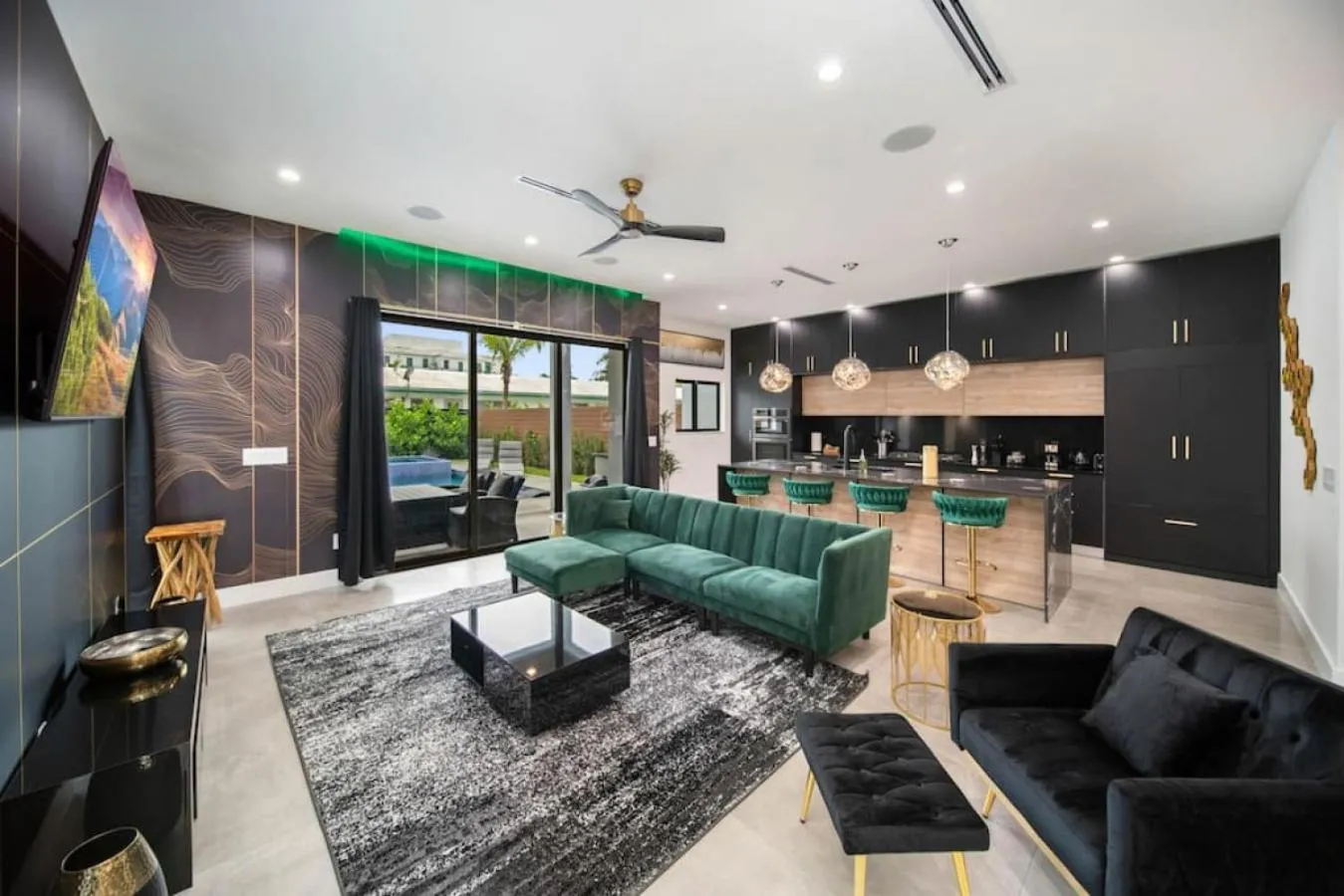 Living room in The Elements Home with 2 Pools
