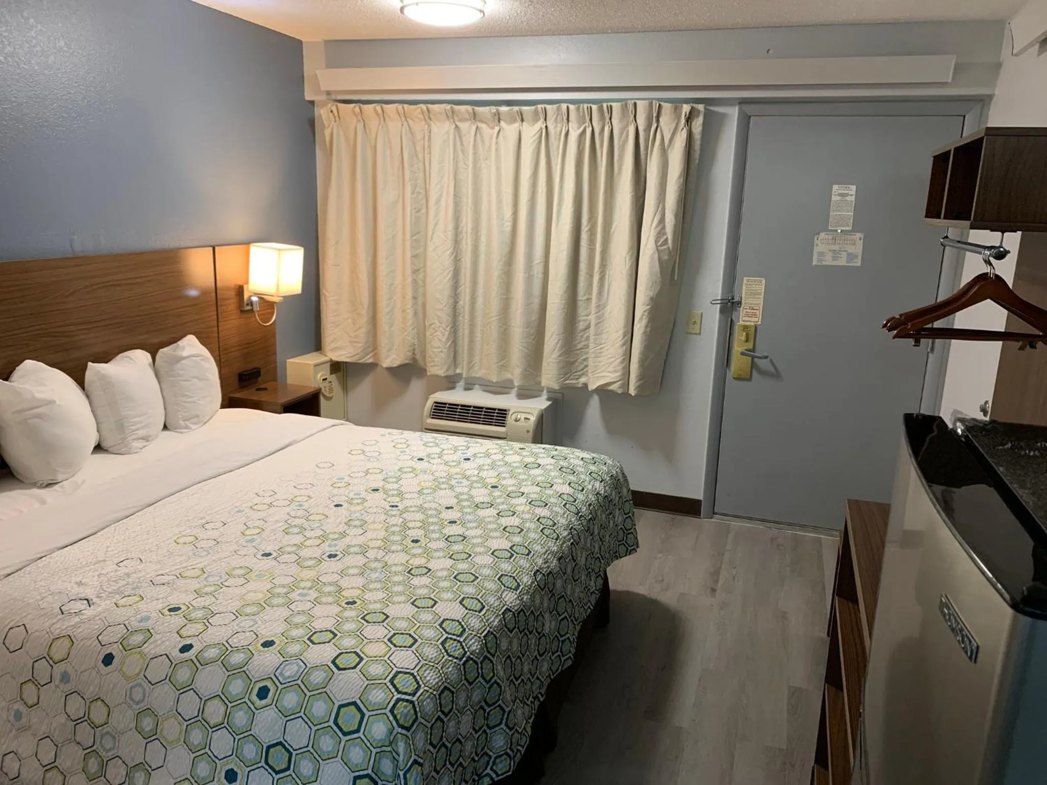 Bedroom, Bed in HomeTowne Studios by Red Roof Mystic - New London