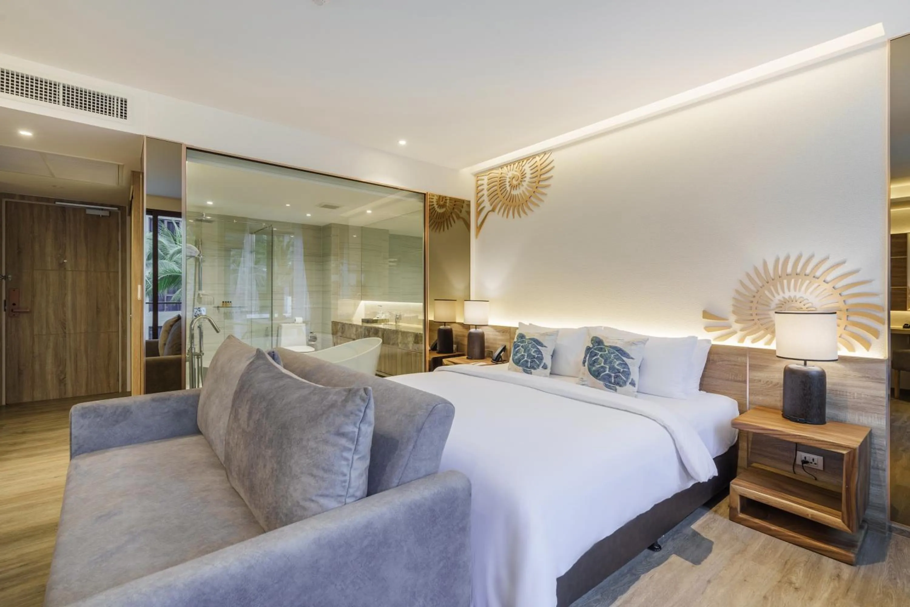 Toilet, Bed in The Marin Phuket Kamala Beach