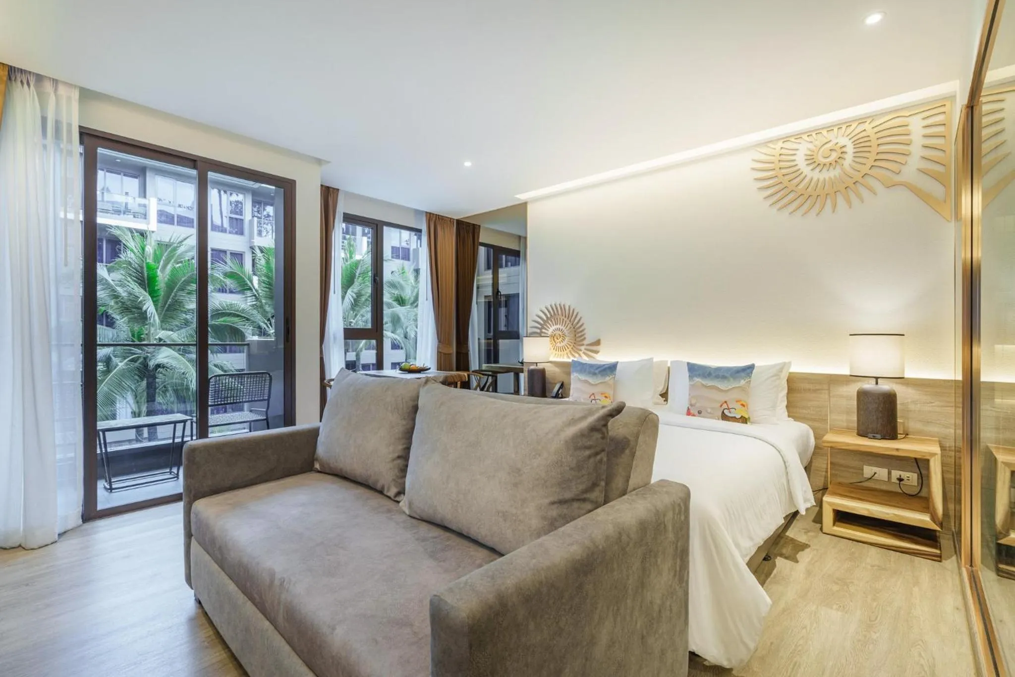 Seating area, Bed in The Marin Phuket Kamala Beach