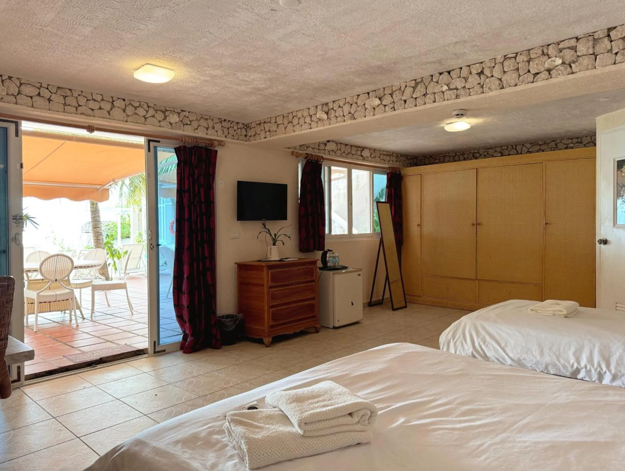 Photo of the whole room, Bed in Sunset Beach Resort