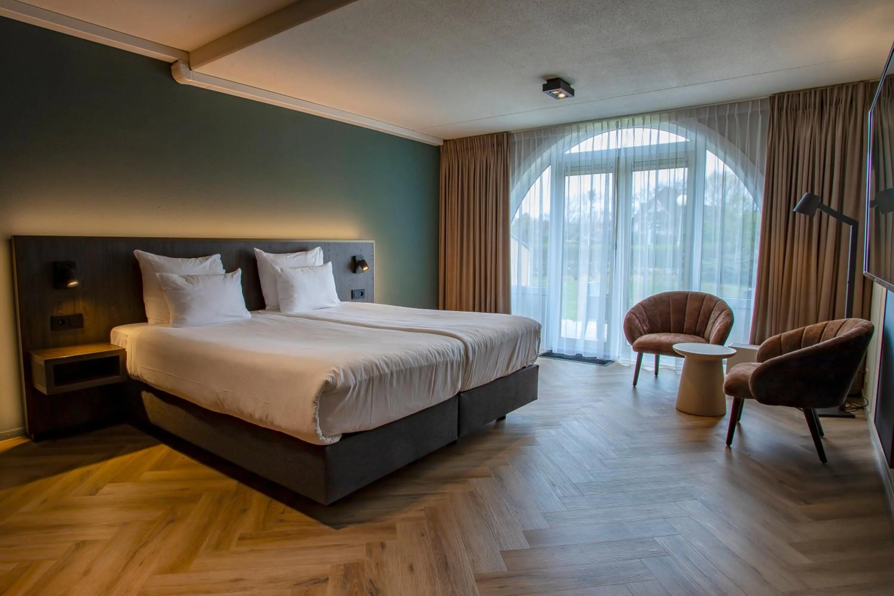Property building, Bed in Hotel Greenside Texel