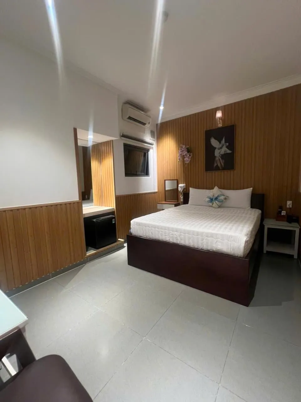 Bed in ĐÔNG NHƯ HOTEL