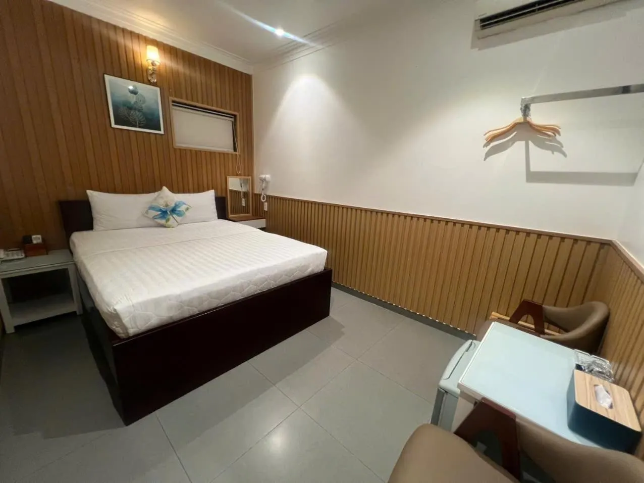 Bed in ĐÔNG NHƯ HOTEL