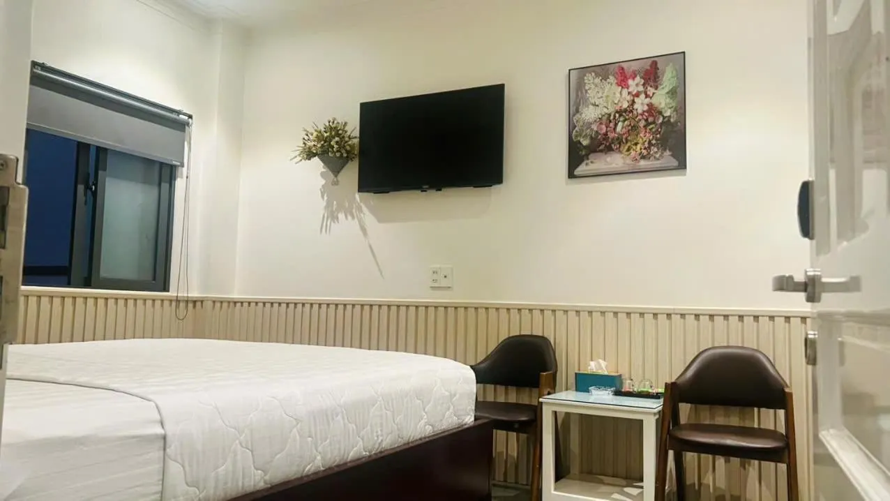 Bed in ĐÔNG NHƯ HOTEL