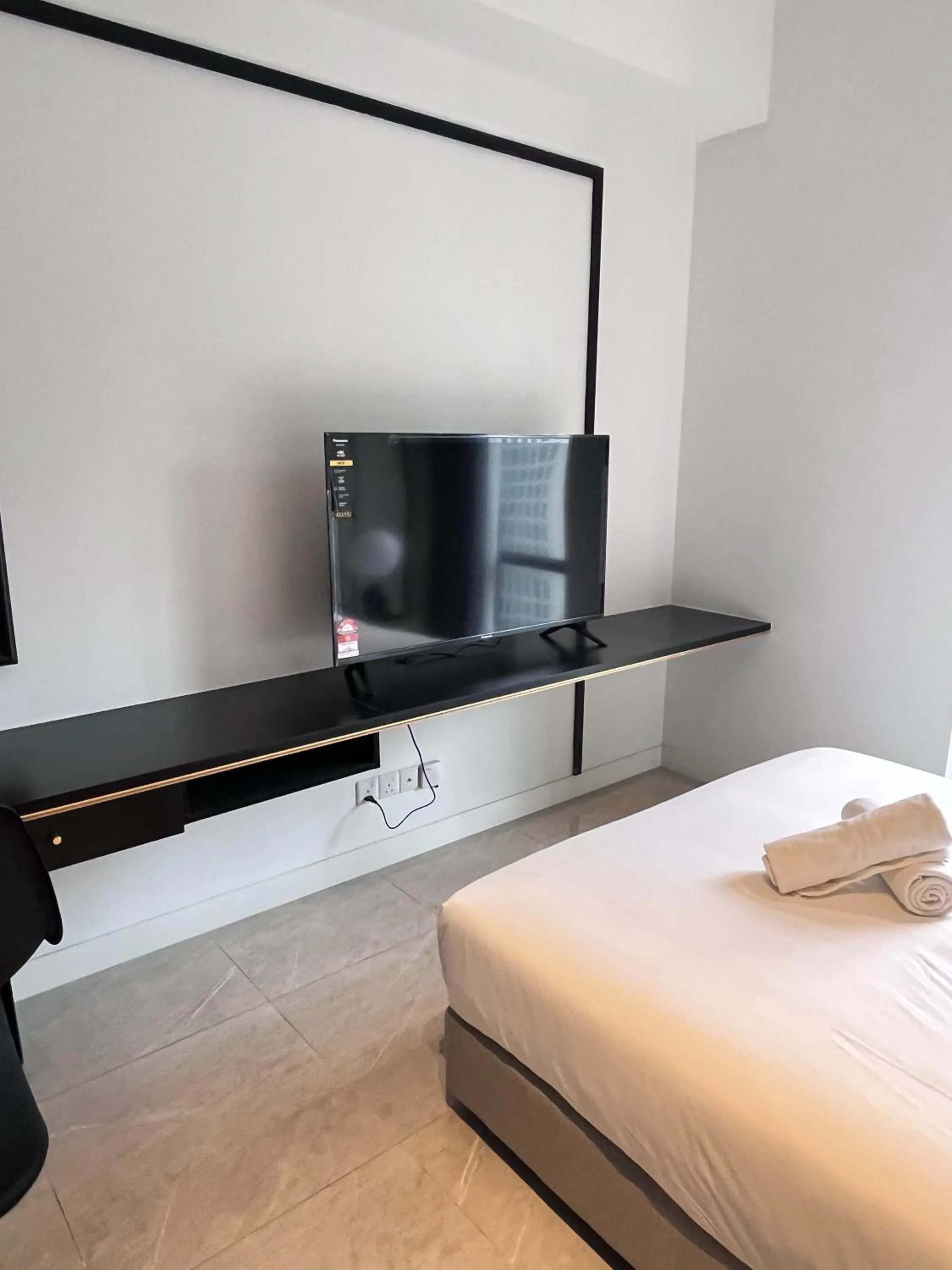 TV and multimedia, Bed in Axon Residence at Pavilion KLCC KL Tower view by KIMIRO