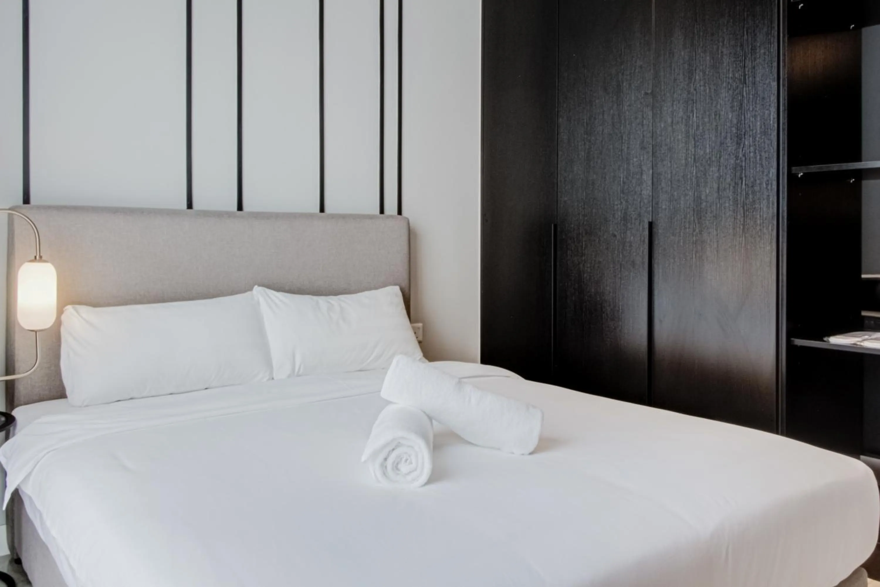 Bed in Axon Residence at Pavilion KLCC KL Tower view by KIMIRO