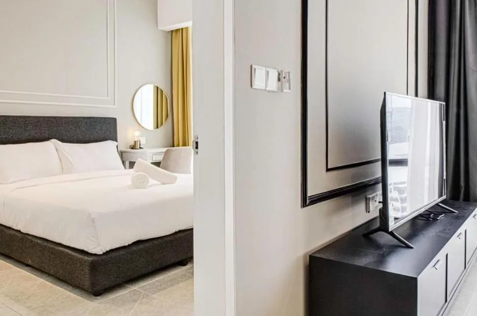 TV and multimedia, Bed in Axon Residence at Pavilion KLCC KL Tower view by KIMIRO