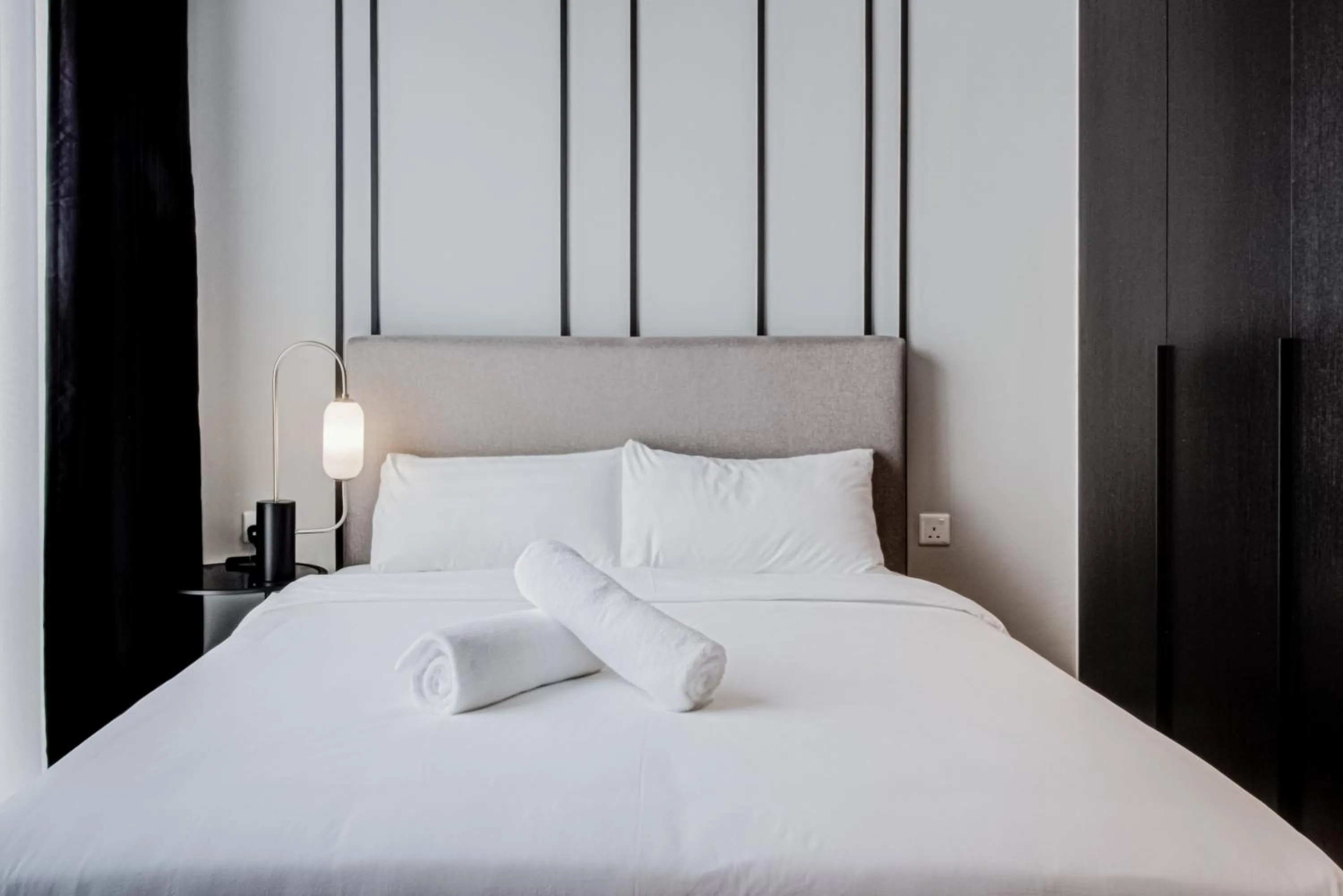 Bed in Axon Residence at Pavilion KLCC KL Tower view by KIMIRO