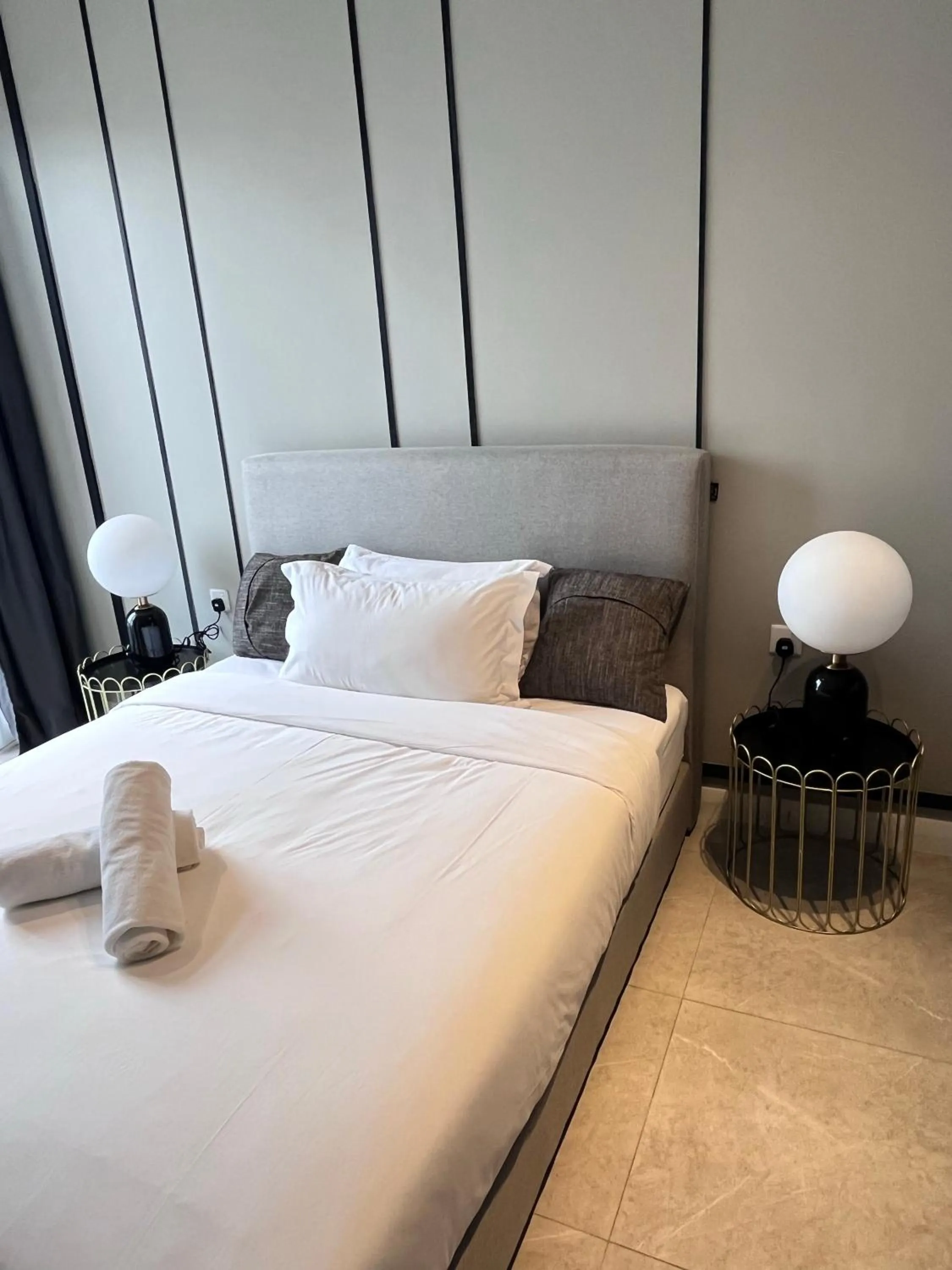 Bed in Axon Residence at Pavilion KLCC KL Tower view by KIMIRO