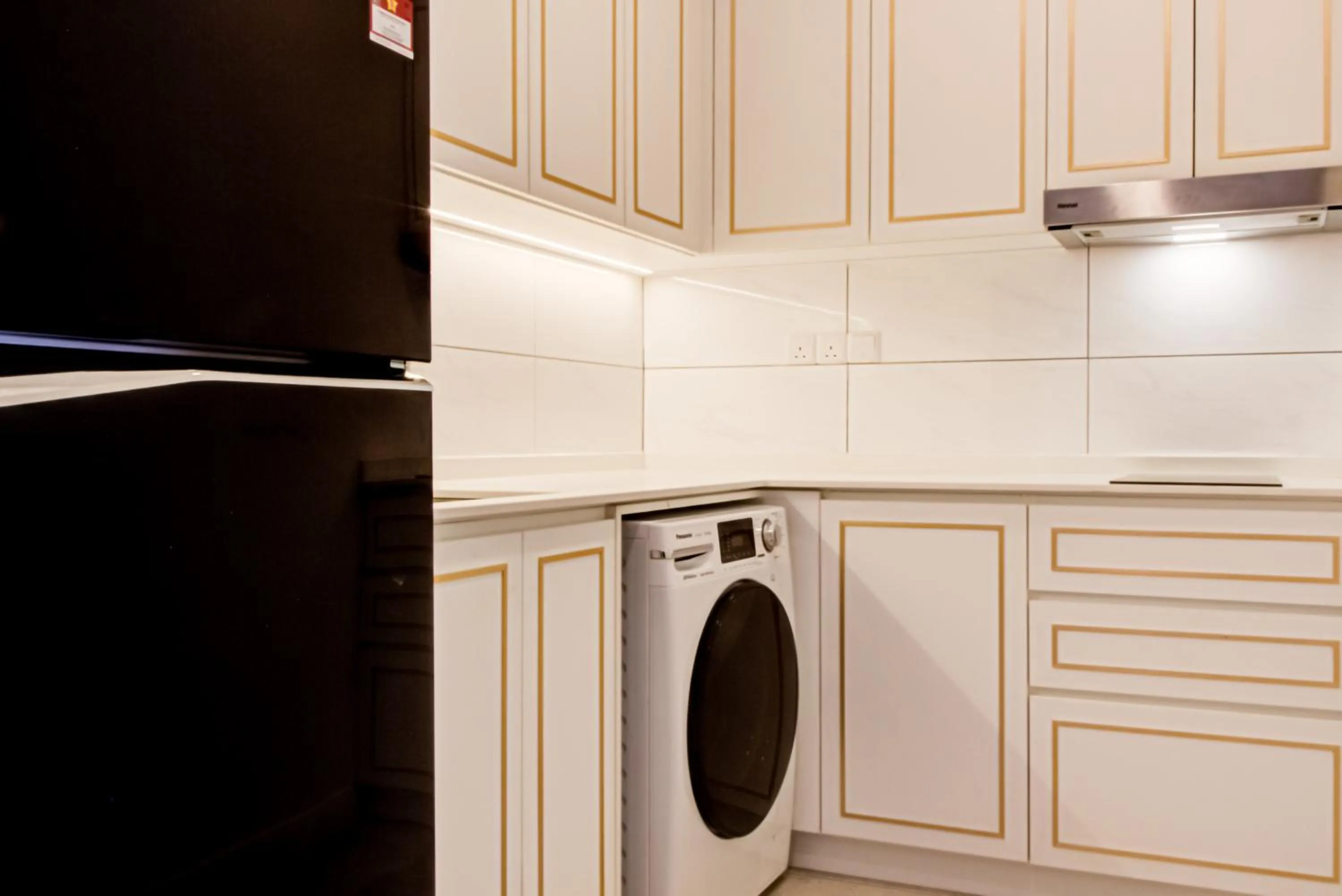 Kitchen or kitchenette in Axon Residence at Pavilion KLCC KL Tower view by KIMIRO