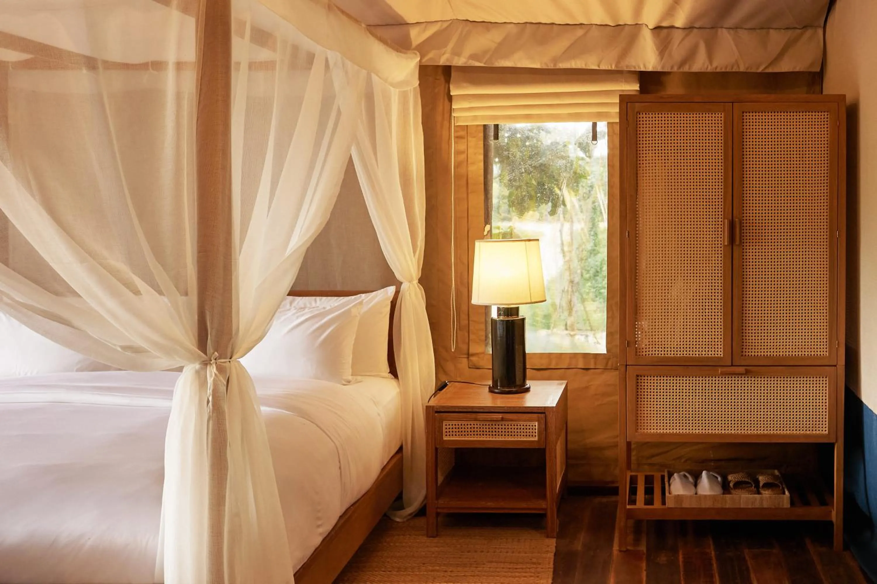 Bed in Tantawan Tented Camp by Dusit, Chiang Rai