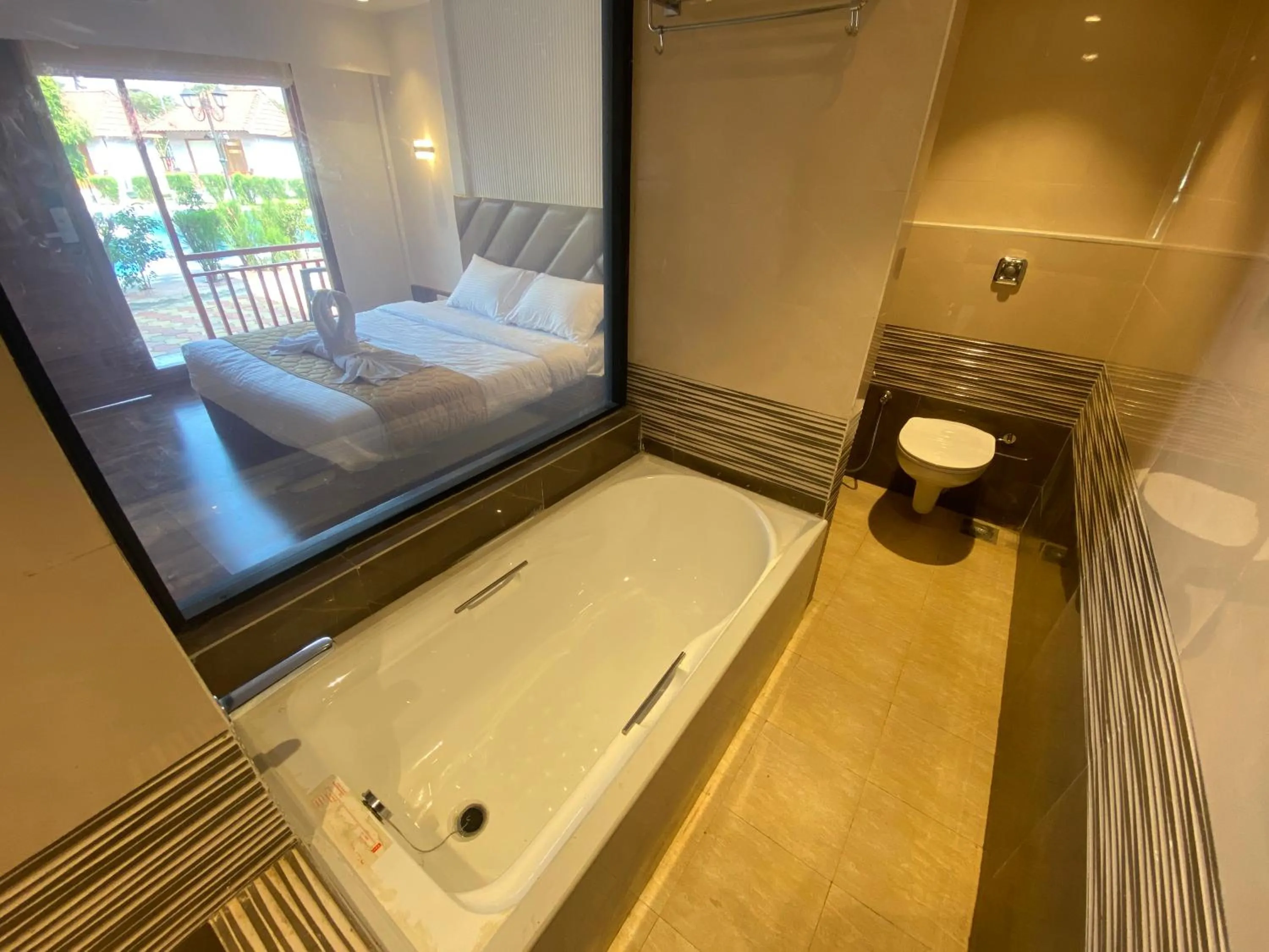 Bathroom, Bed in DAN Resorts & Weddings