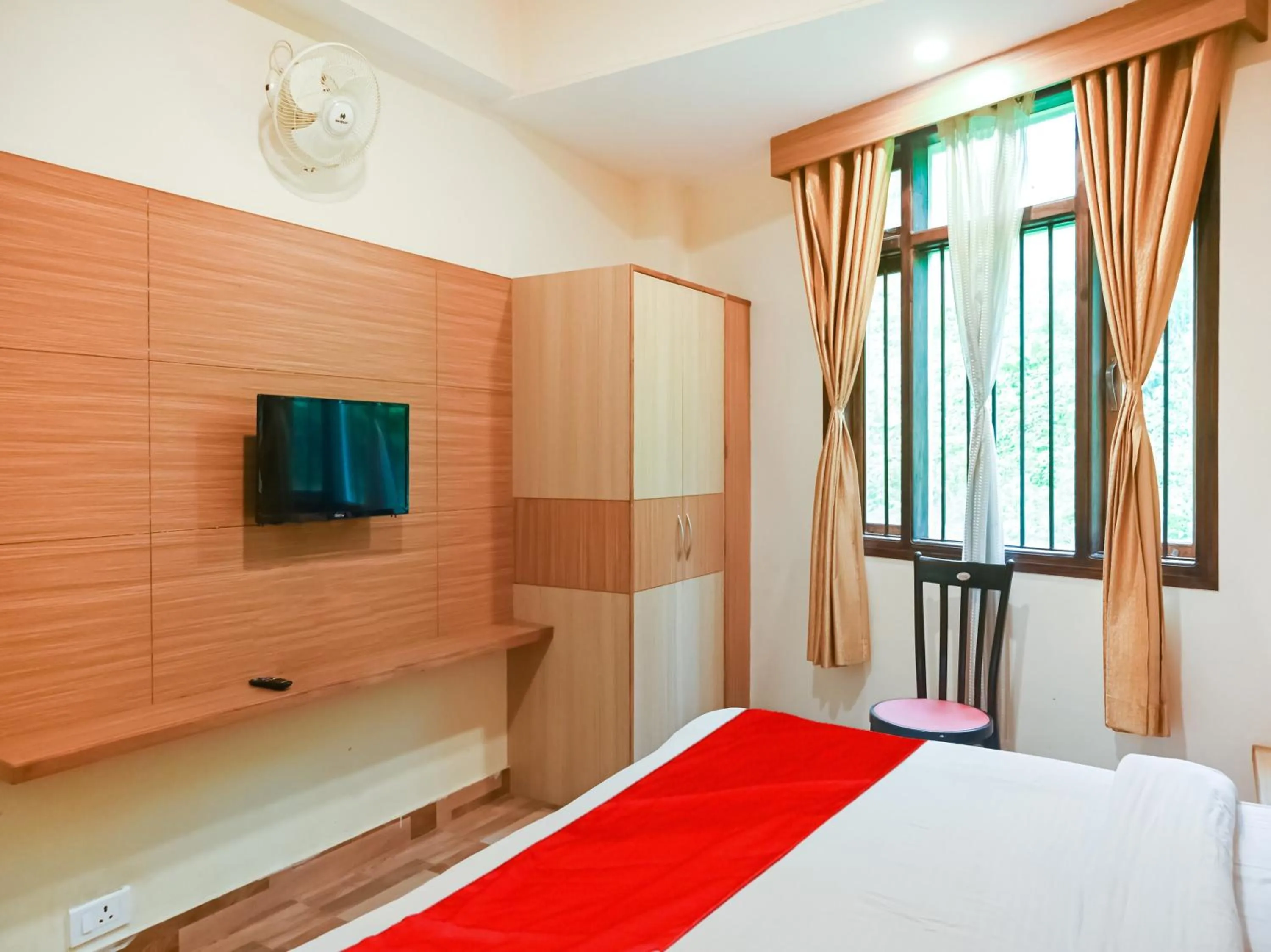 Bedroom in Collection O Kanchanjangha Darshan