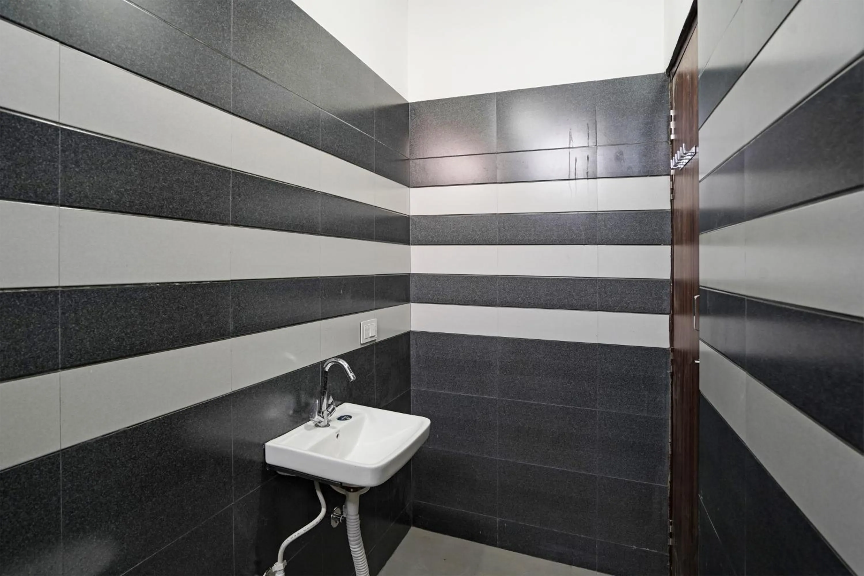 Bathroom in Hotel O Flagship Hotel Lotus Highway Inn