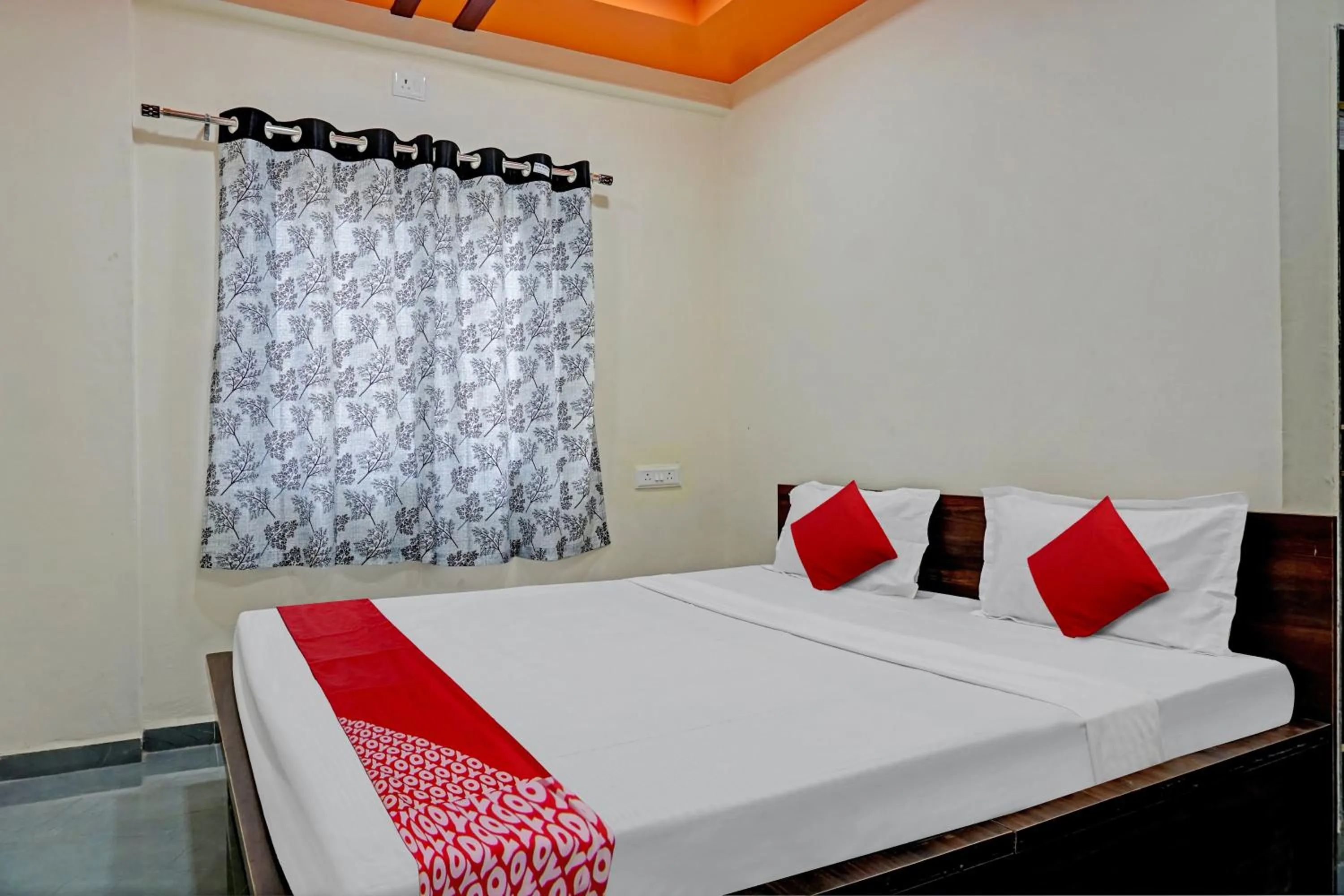 Bedroom in OYO Flagship Sai Balaji Lodge