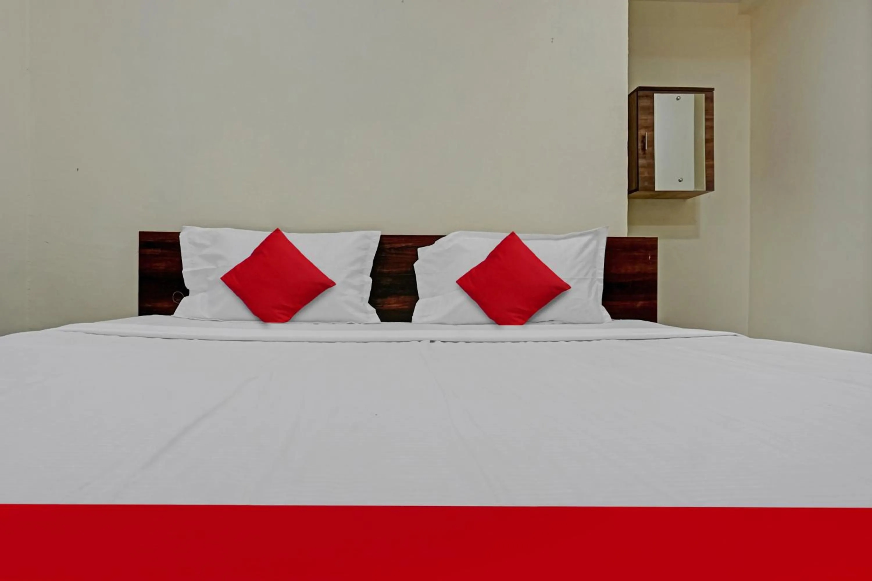 Bedroom in OYO Flagship Sai Balaji Lodge