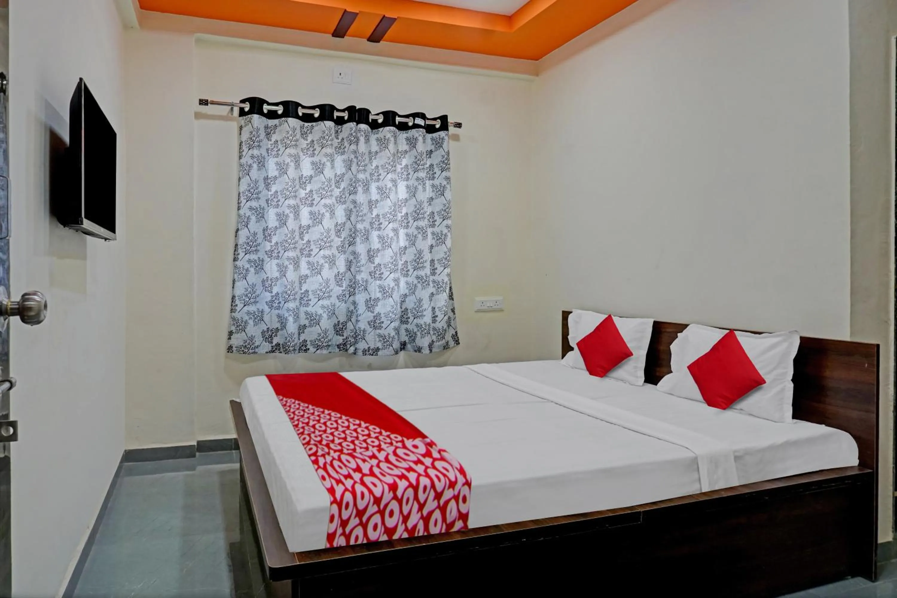 Bedroom in OYO Flagship Sai Balaji Lodge