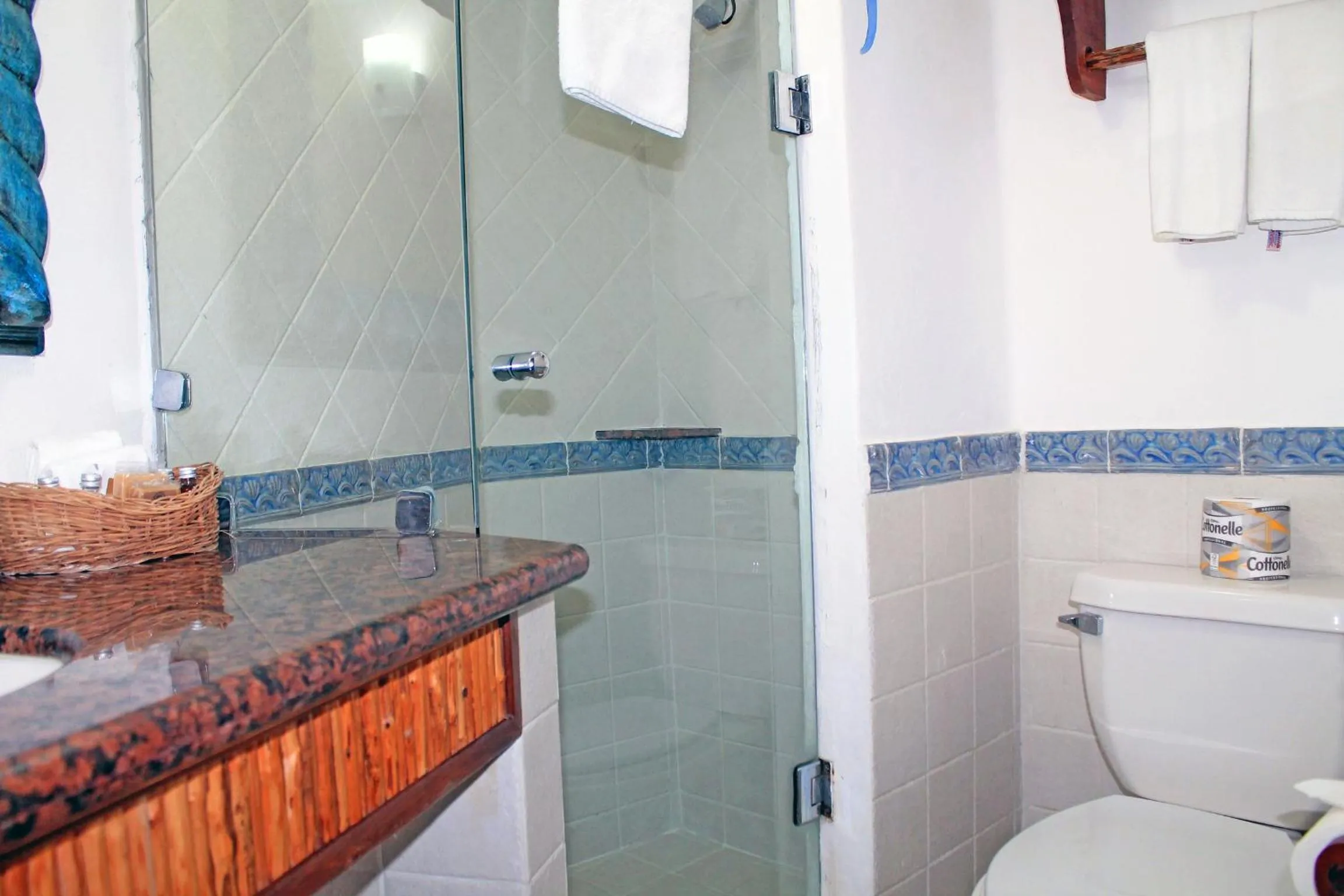 Bathroom in Casa del Mar Cozumel Hotel & Dive Resort with free access to an exclusive beach club