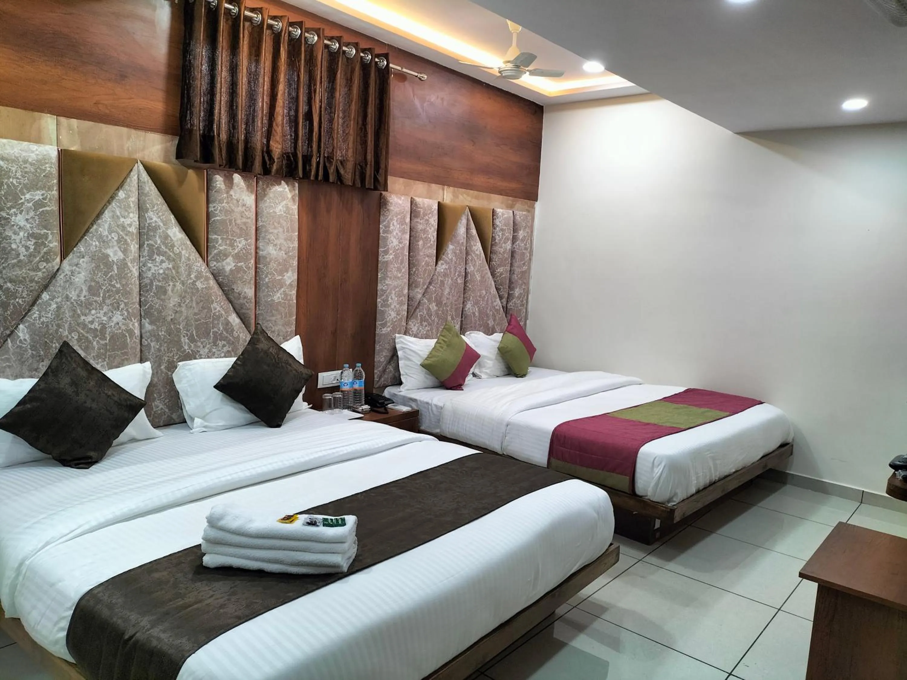 Bed in Hotel Divya Palace