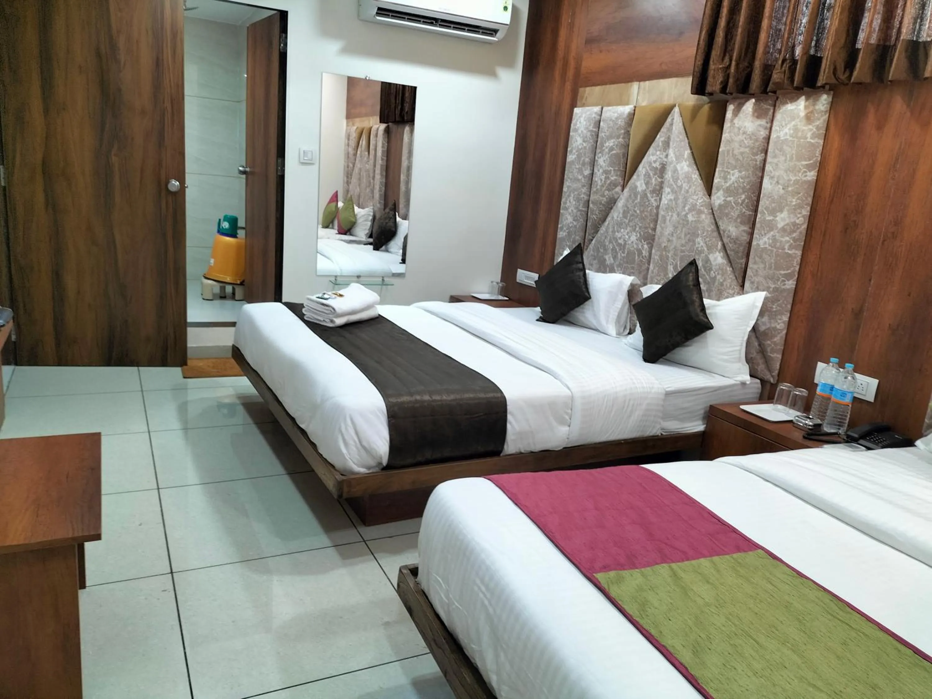 Bed in Hotel Divya Palace