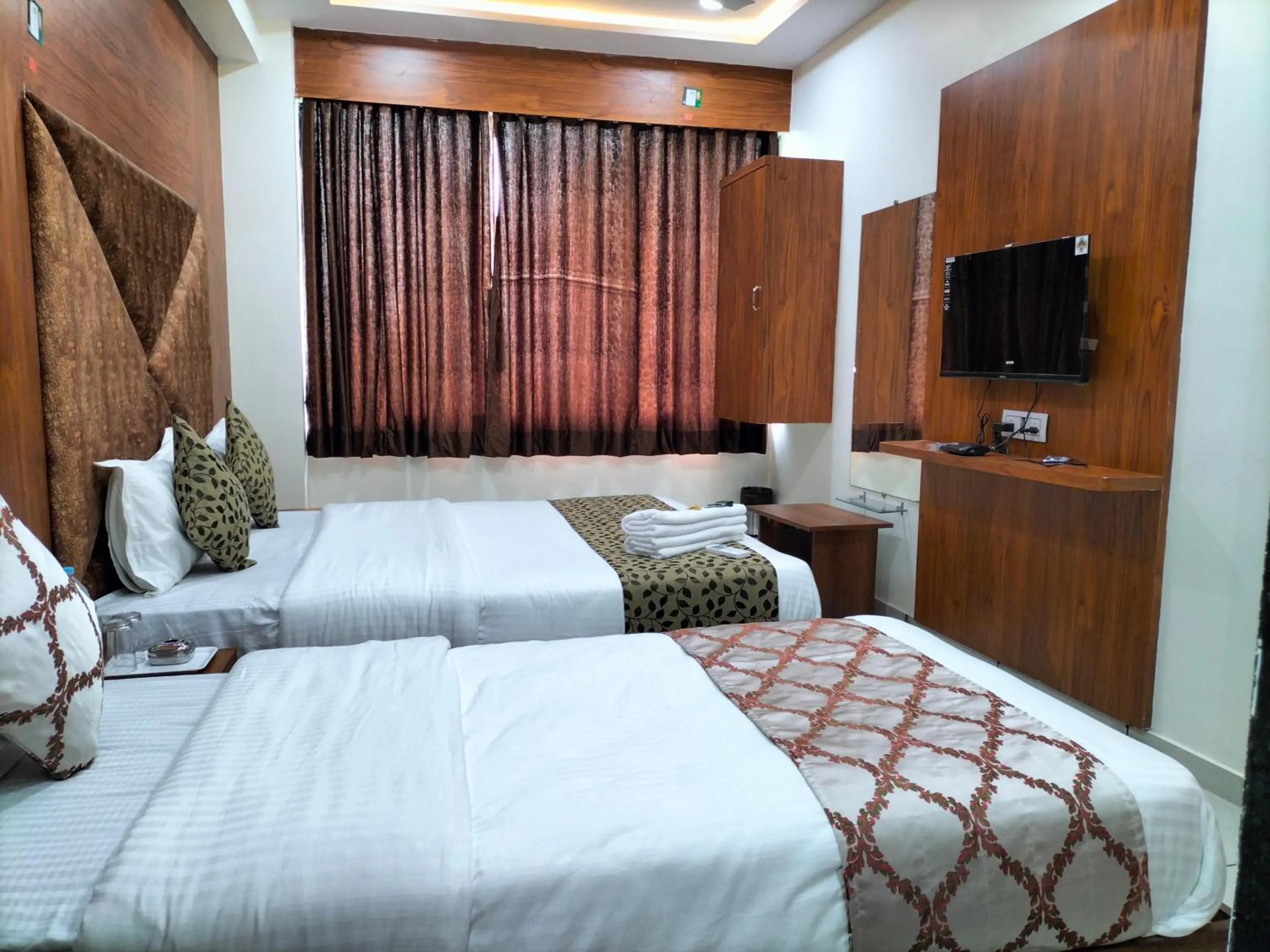 Bed in Hotel Divya Palace