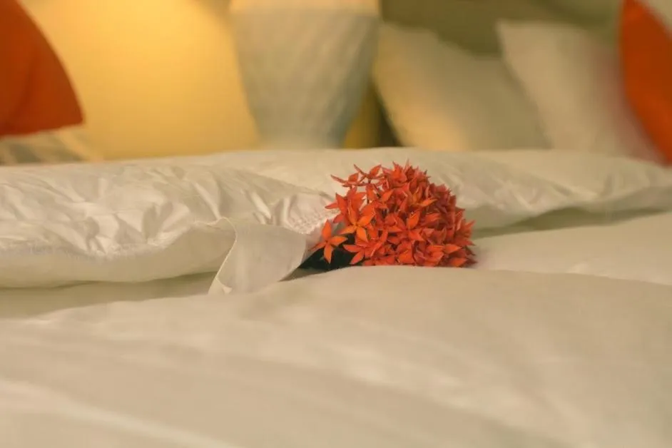 Bed in Sunset Shores Beach Hotel