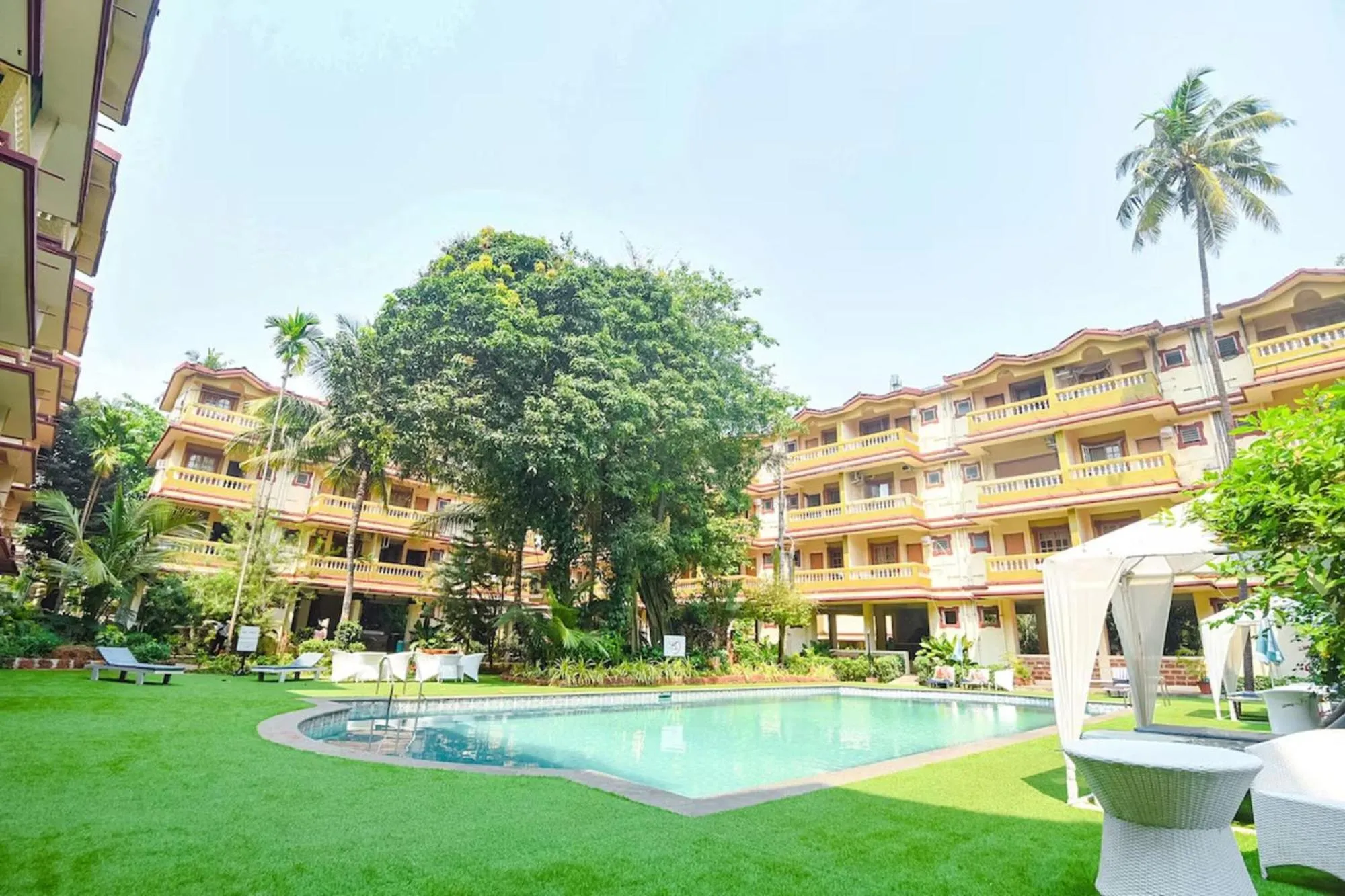 Swimming pool in FabHotel Prime Emerald Highland - 500M From Candolim Beach