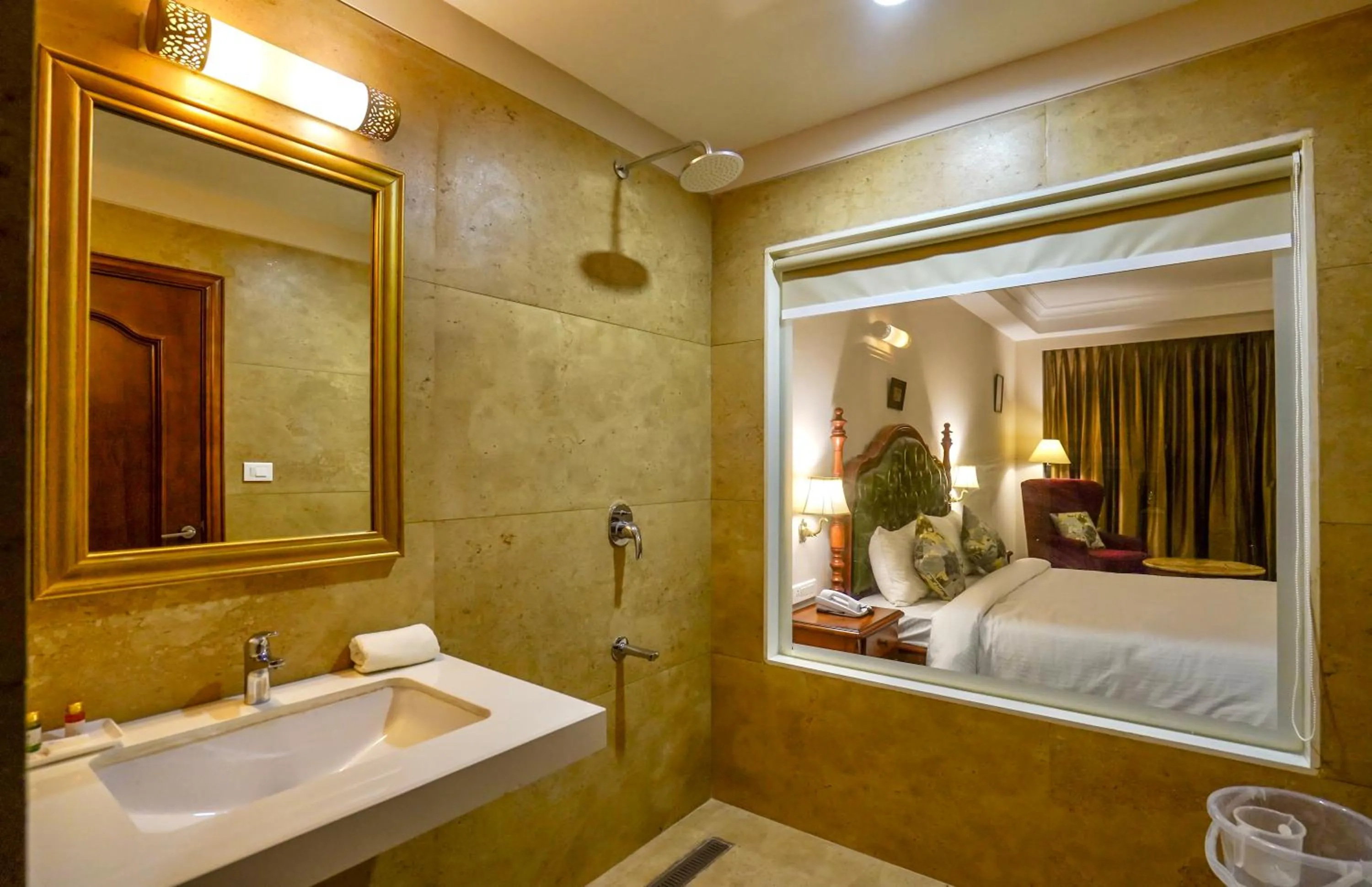 Bathroom, Bed in Ranbanka Heritage Resort 1 km from Bhilwara Railway Station