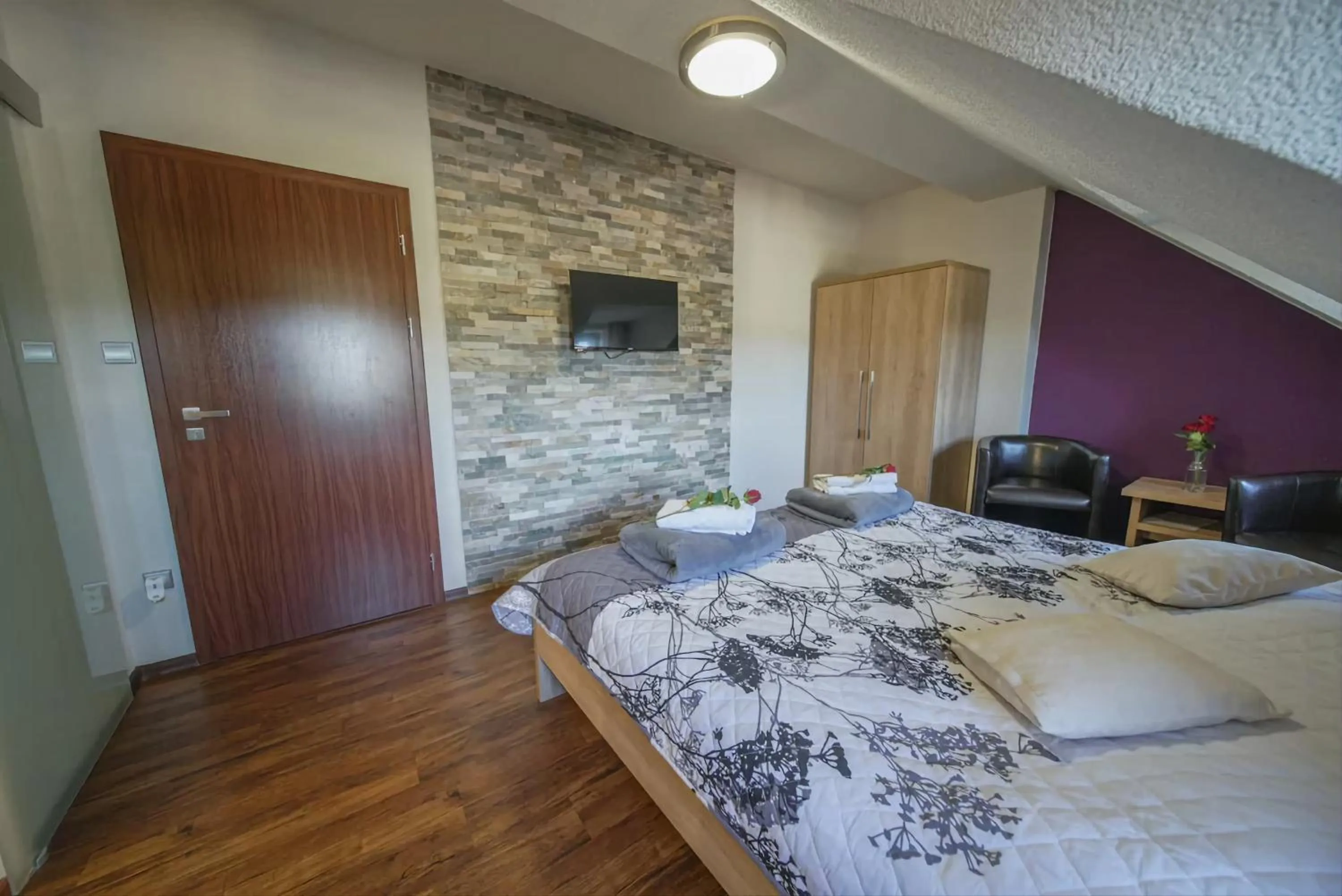 Seating area, Bed in Wellness Penzion Life