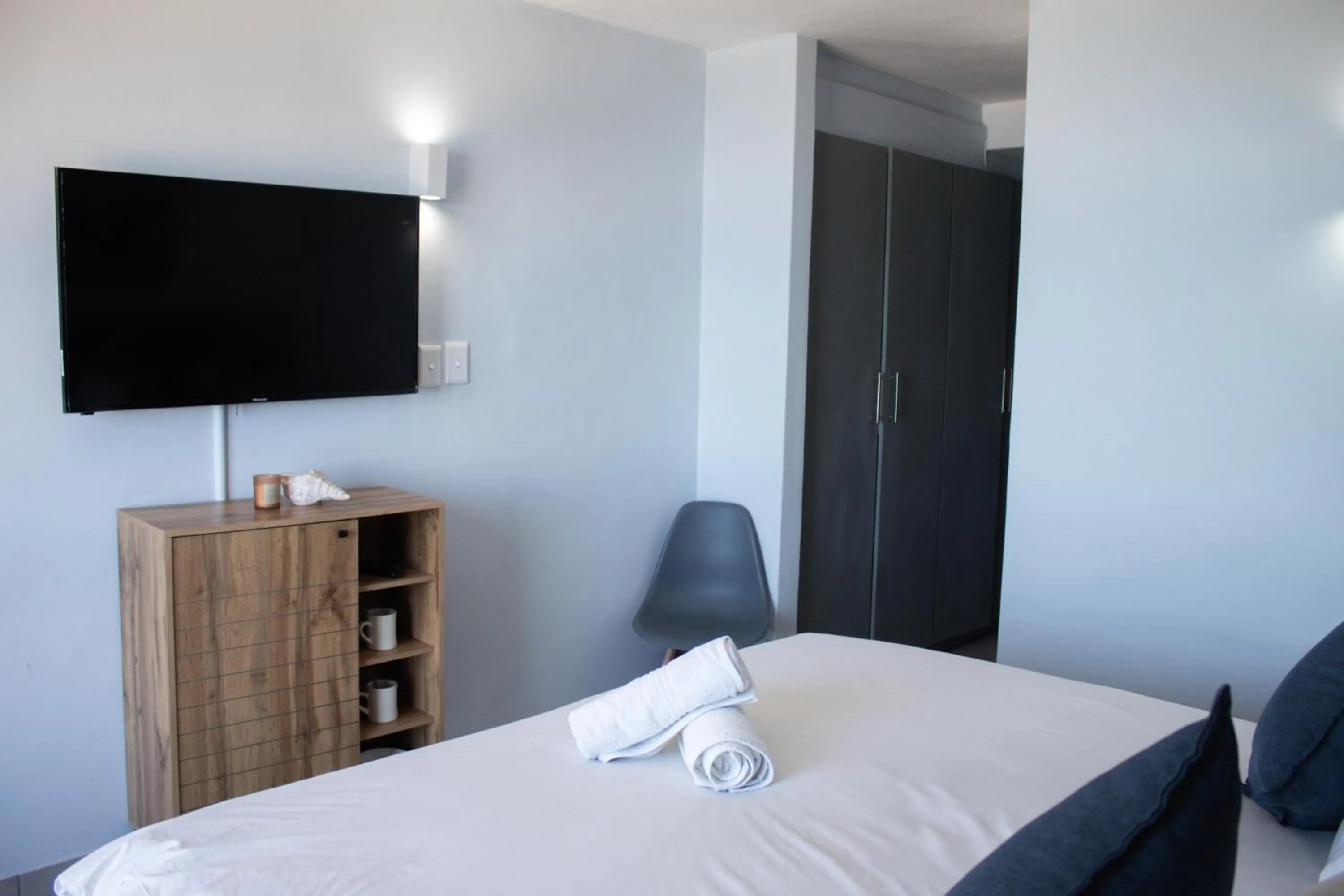 Bed in Ocean Breeze Hotel